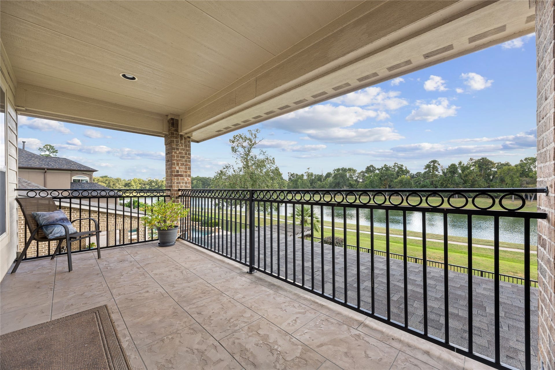 18515 Duke Lake Drive, Spring, TX 77388 Take in the beautiful water views from your private covered upstairs balcony! An inviting place to enjoy morning coffee, fresh air, or a peaceful evening outdoors.