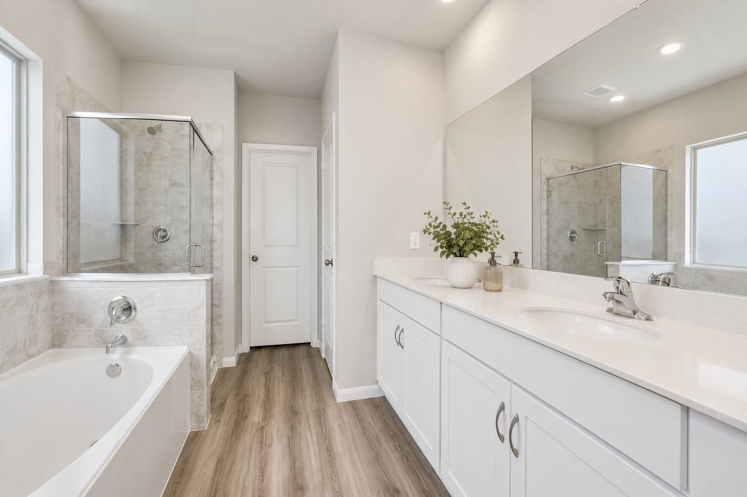 1311 Bonnerjee Drive, Crosby, TX 77532 Spacious primary bedroom featuring abundant natural light, neutral finishes, and plenty of room to create a comfortable and relaxing retreat