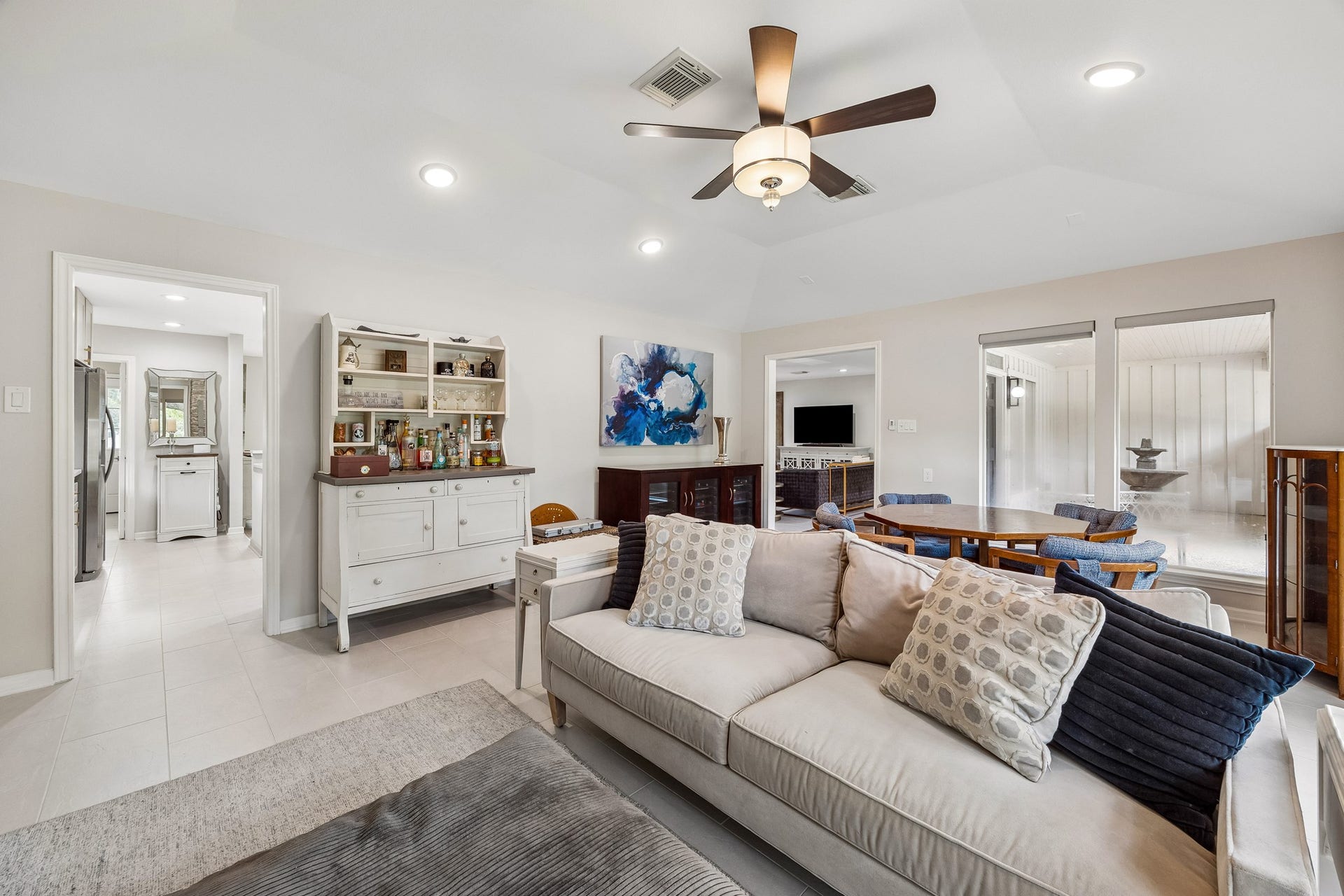 12314 Honeywood Trail, Houston, TX 77077 Open to the kitchen and living room, this versatile space offers abundant natural light and a seamless, welcoming flow to the rest of the house.