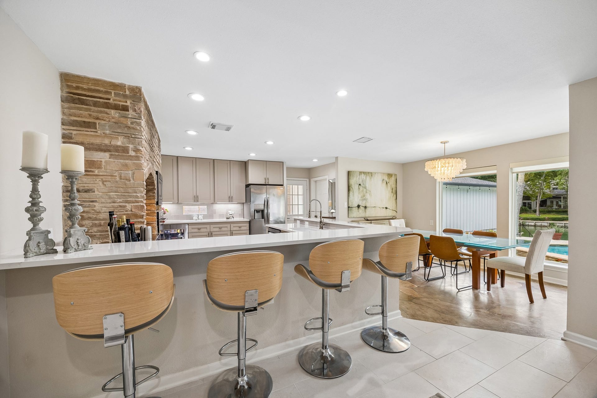 12314 Honeywood Trail, Houston, TX 77077 The kitchen is bordered by a large breakfast bar providing space for ample seating and abundant counter space for serving.