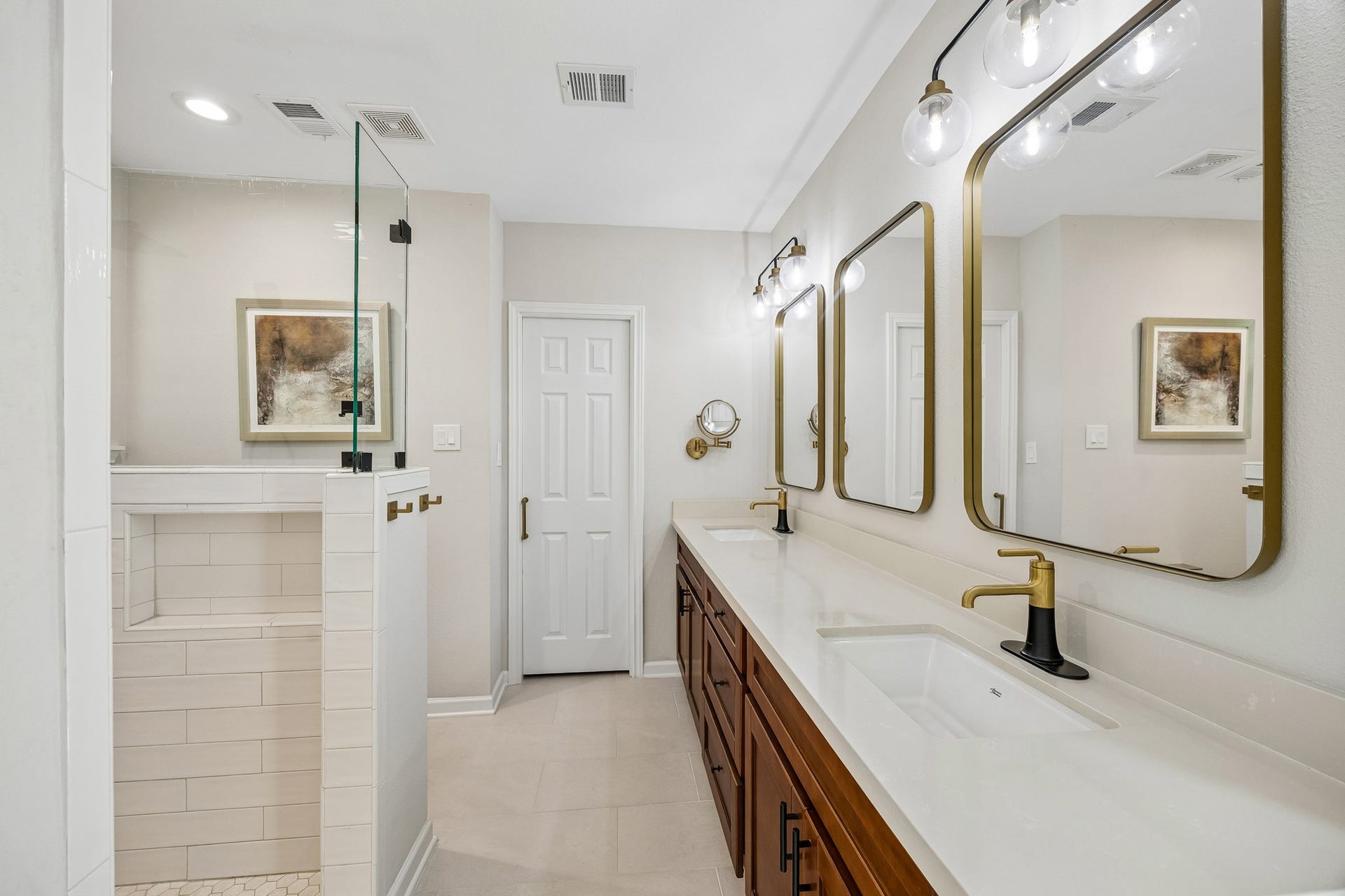 12314 Honeywood Trail, Houston, TX 77077 Additional view of the Primary Bath highlights the extended vanity and modern fixtures. The door at the end leads to the larger of two Primary Closets.