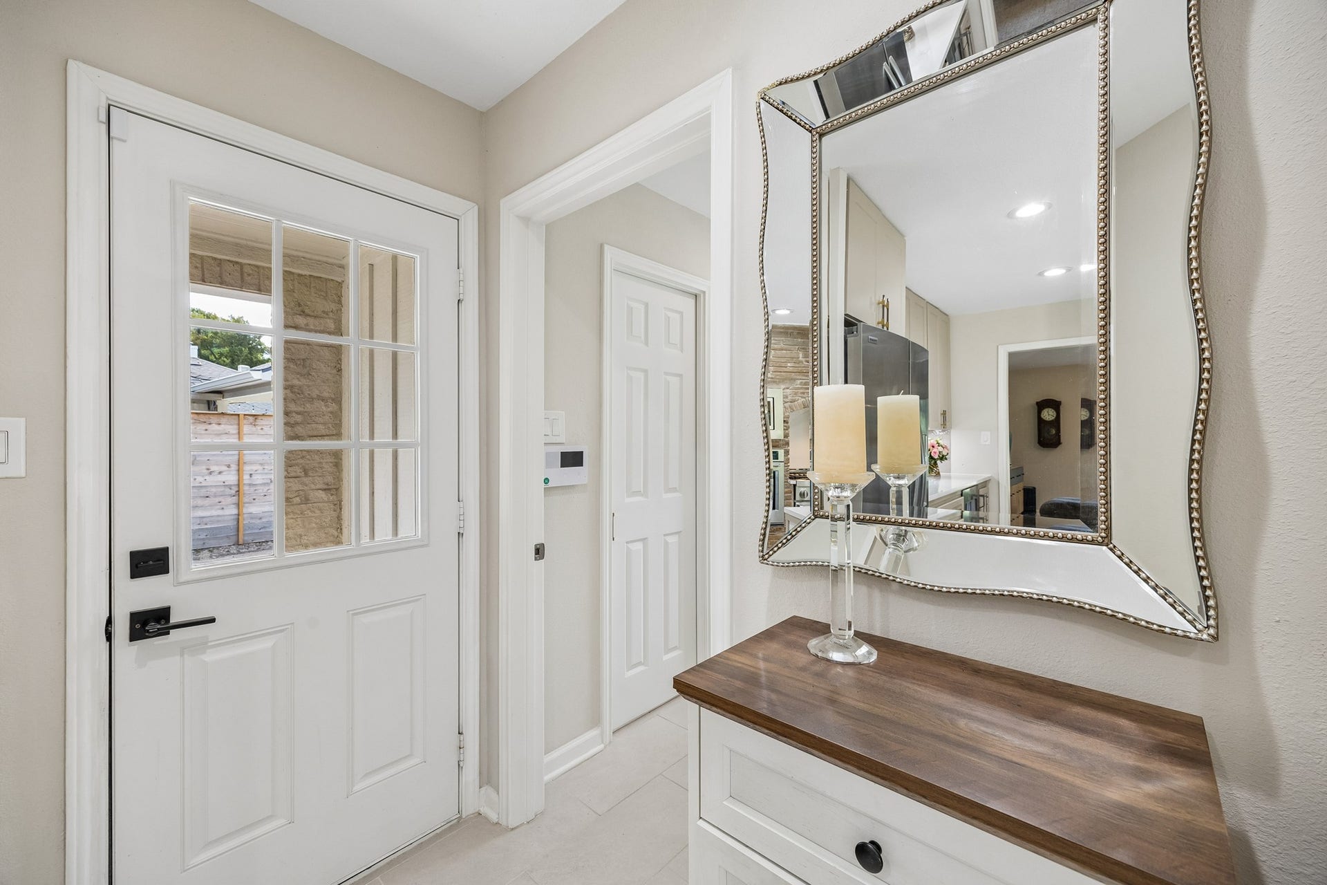 12314 Honeywood Trail, Houston, TX 77077 To the right of the side entrance, a hallway leads to the spacious walk-in pantry and conveniently located half bath, also accessible from the pool area.