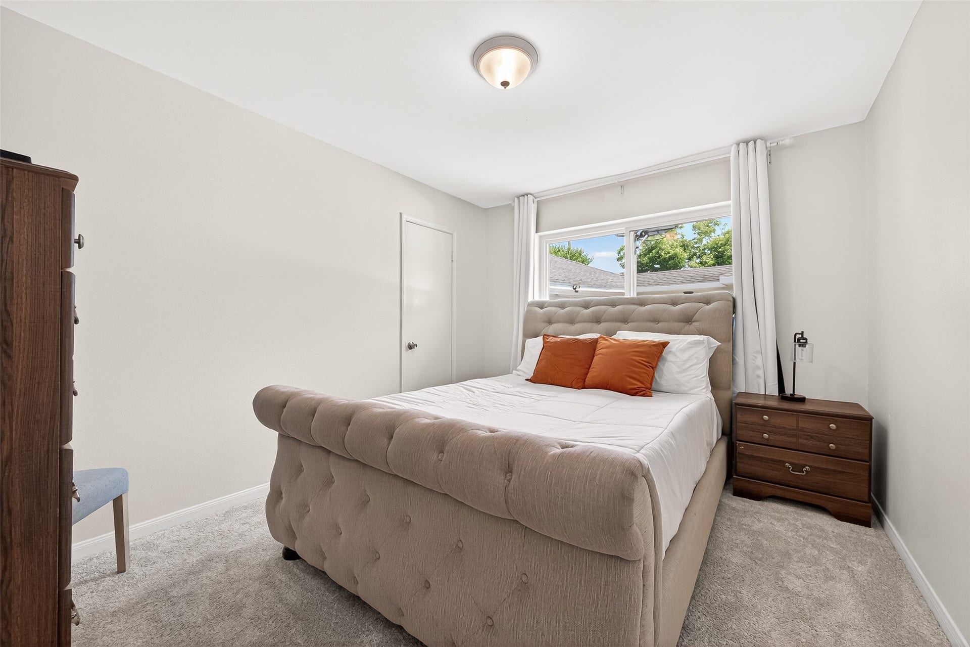 2610 Teague Road, Houston, TX 77080 Secondary bedroom with large window.