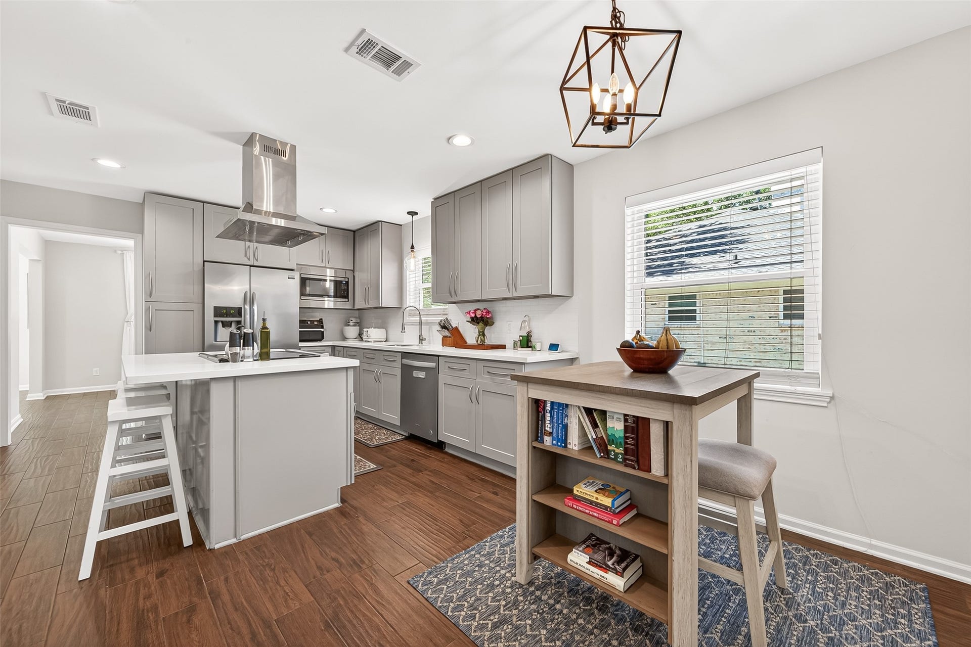 2610 Teague Road, Houston, TX 77080 Breakfast nook off the kitchen with beautiful light fixture.