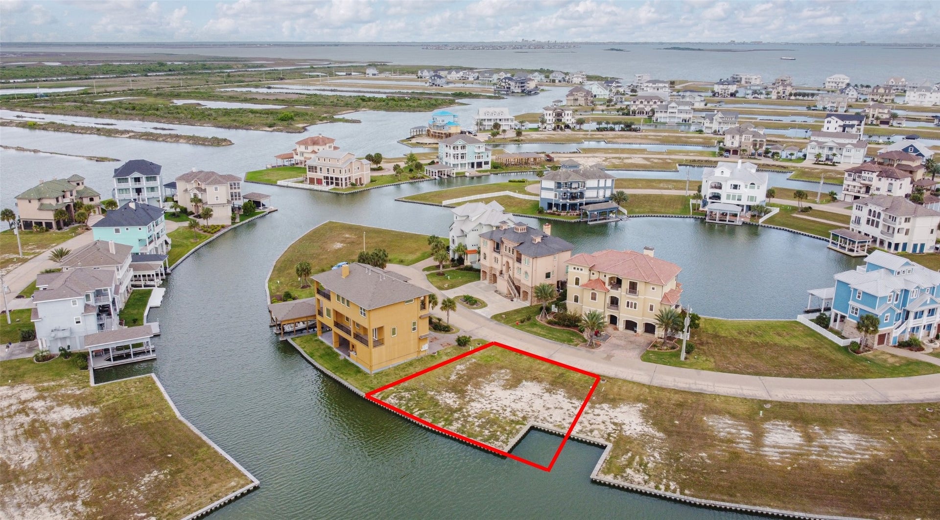 7 Big Torch, Hitchcock, TX 77563 This beautiful marina-side lot is tucked near the end of a cul-de-sac in the heart of Harborwalk, offering a peaceful setting within this sought-after waterfront community. Harborwalk features a manned gated entrance, plus an additional gated entrance into the residential section of the neighborhood for added privacy and security. Boundary lines are approximate.