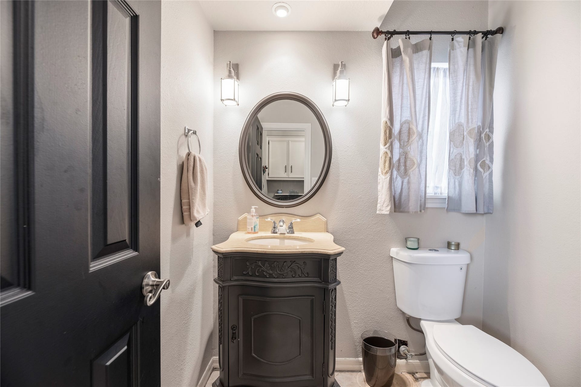 Downstairs half bathroom.