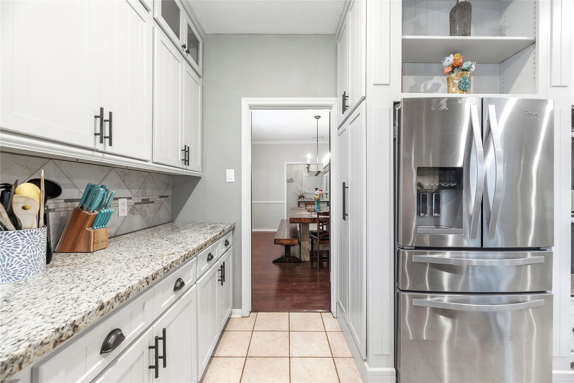 The dining room flows seamlessly into the kitchen.