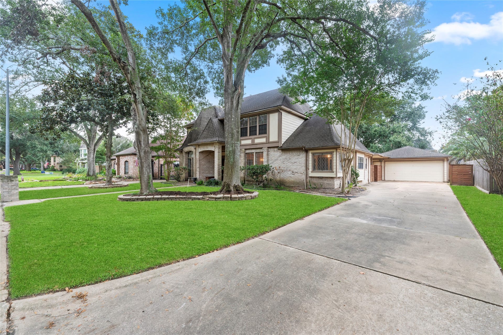 2-car detached garage and a long driveway provide plenty of parking.