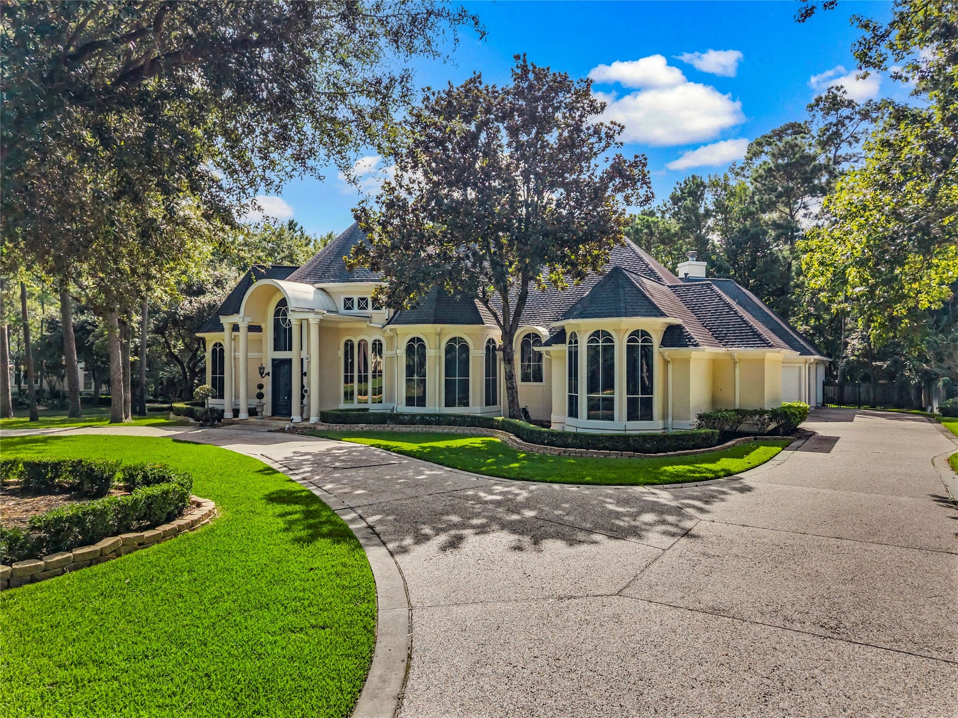 Beautiful estate home with circle drive and side load 3 car garage (oversized!)