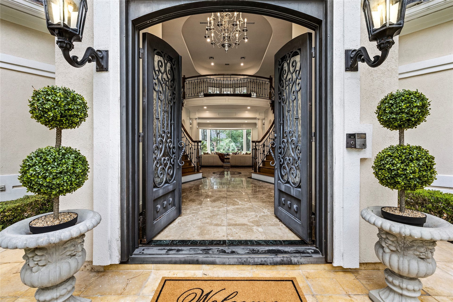 Double iron doors invite you home.