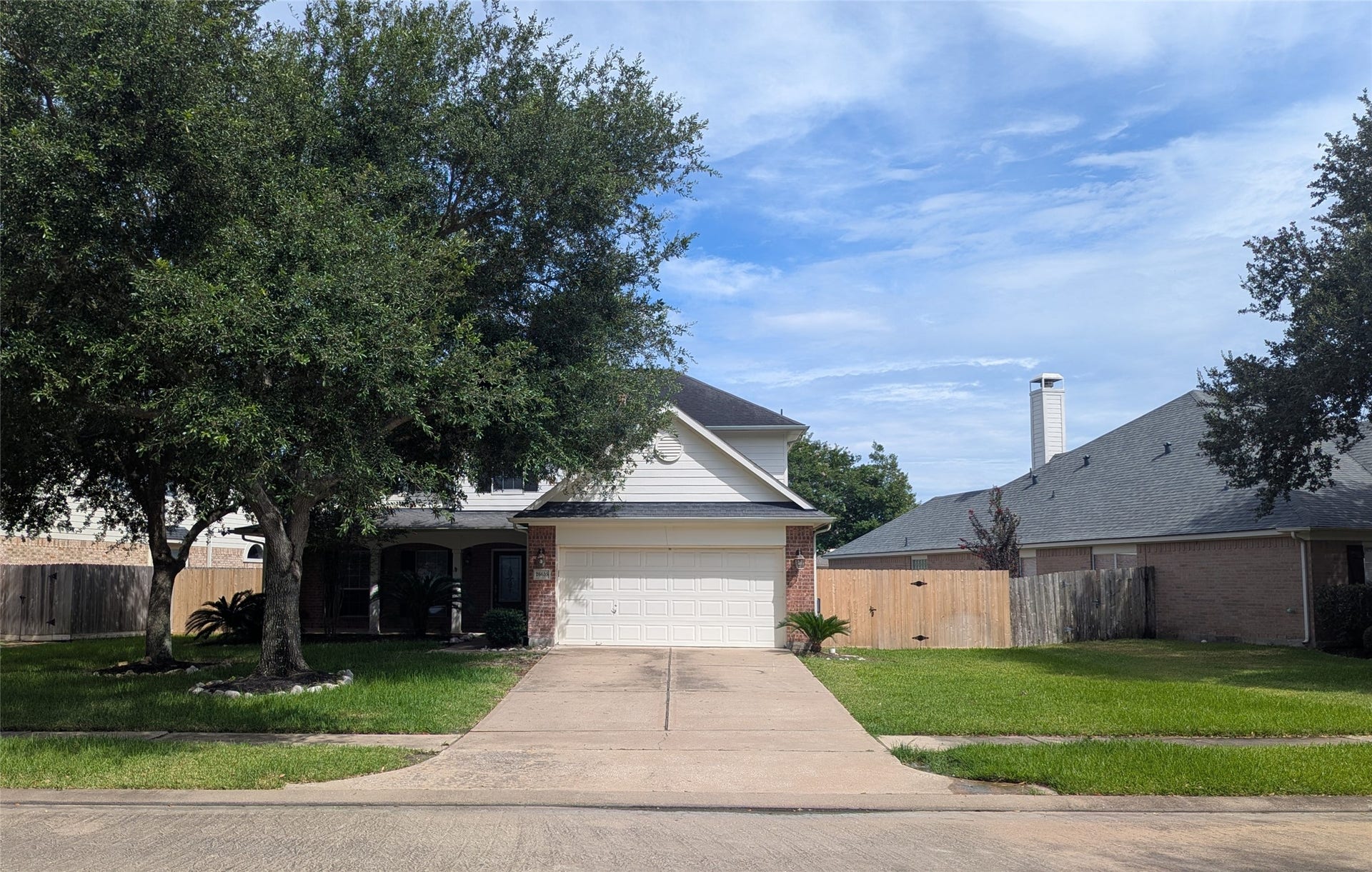 26635 Summerbend Hollow Lane, Katy, TX 77494 Well maintained 4-bedroom home in the heart of Katy with charming wide front porch and brick elevation