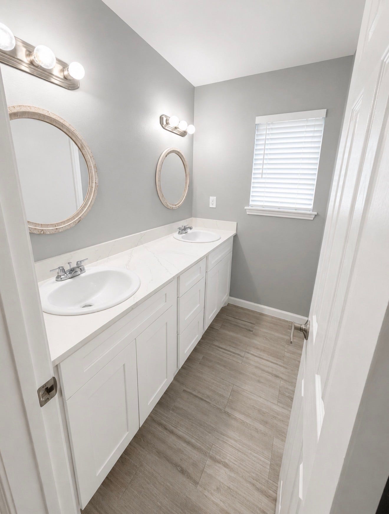 Upstairs Secondary bathroom with double vanity.