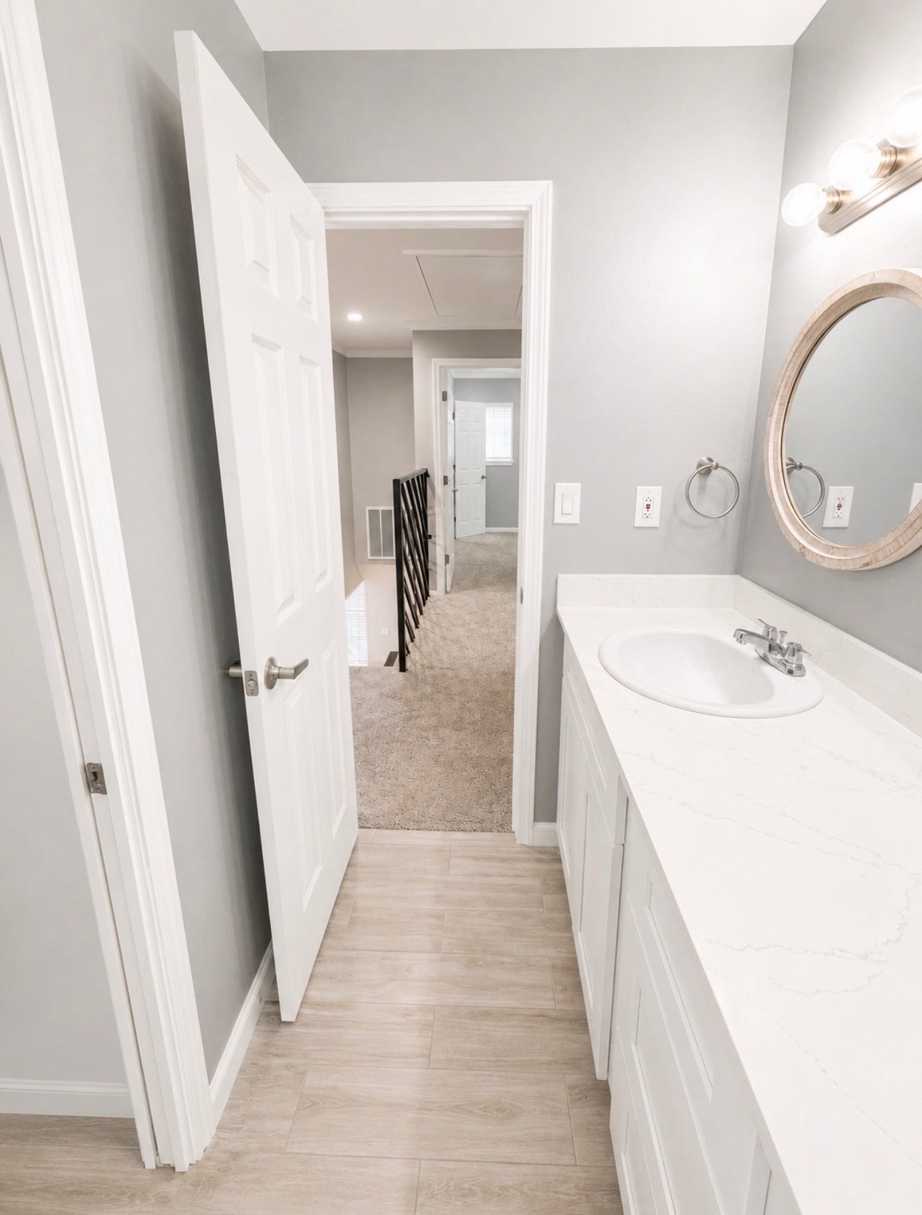 View towards hallway from secondary bath.