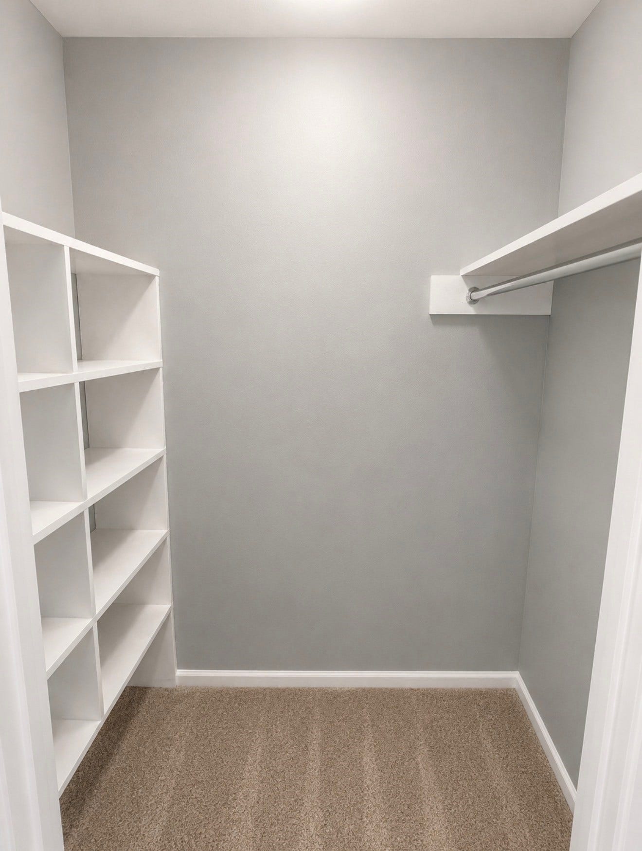 Large walk in closet with shelf storage bedroom in bedroom one.