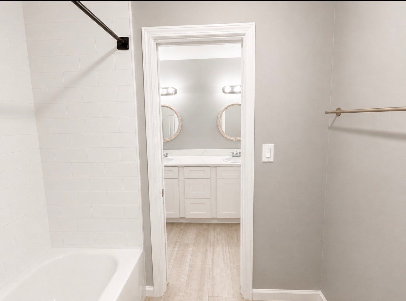 View from shower room into secondary vanity area.