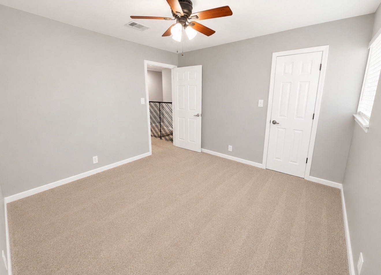 Bedroom Number One Upstairs facing hallway.