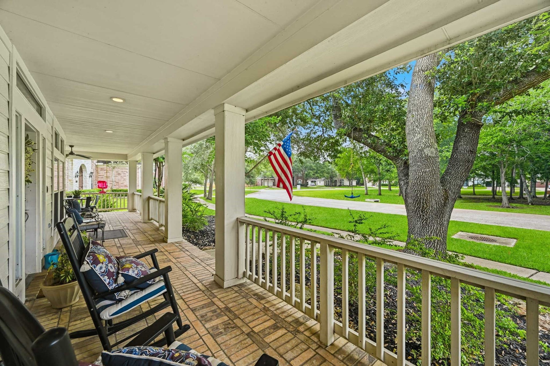 3807 Oakland Circle, Missouri City, TX 77459 Wrap around front porch witth views of the wooded park across the street