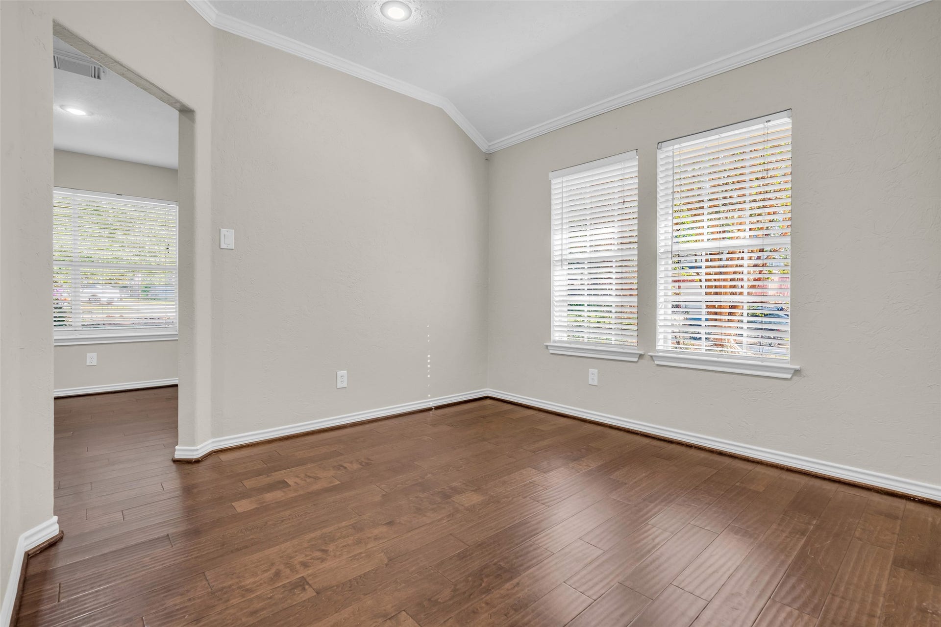 14 Almond Branch Place, The Woodlands, TX 77382 Bright and inviting dining room offers a seamless flow into the breakfast nook.