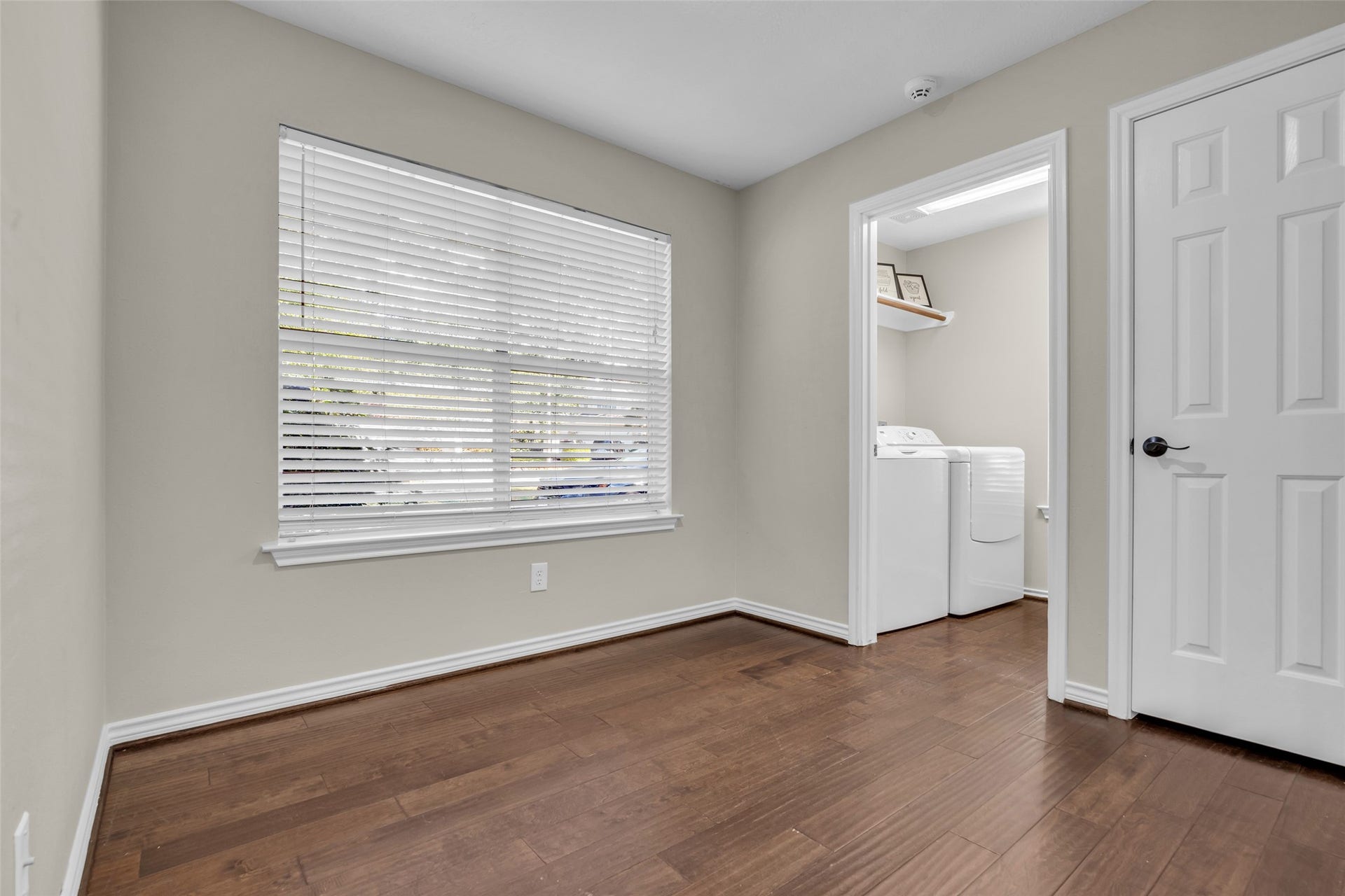 14 Almond Branch Place, The Woodlands, TX 77382 Laundry Room located off the breakfast nook, the closed door is a pantry