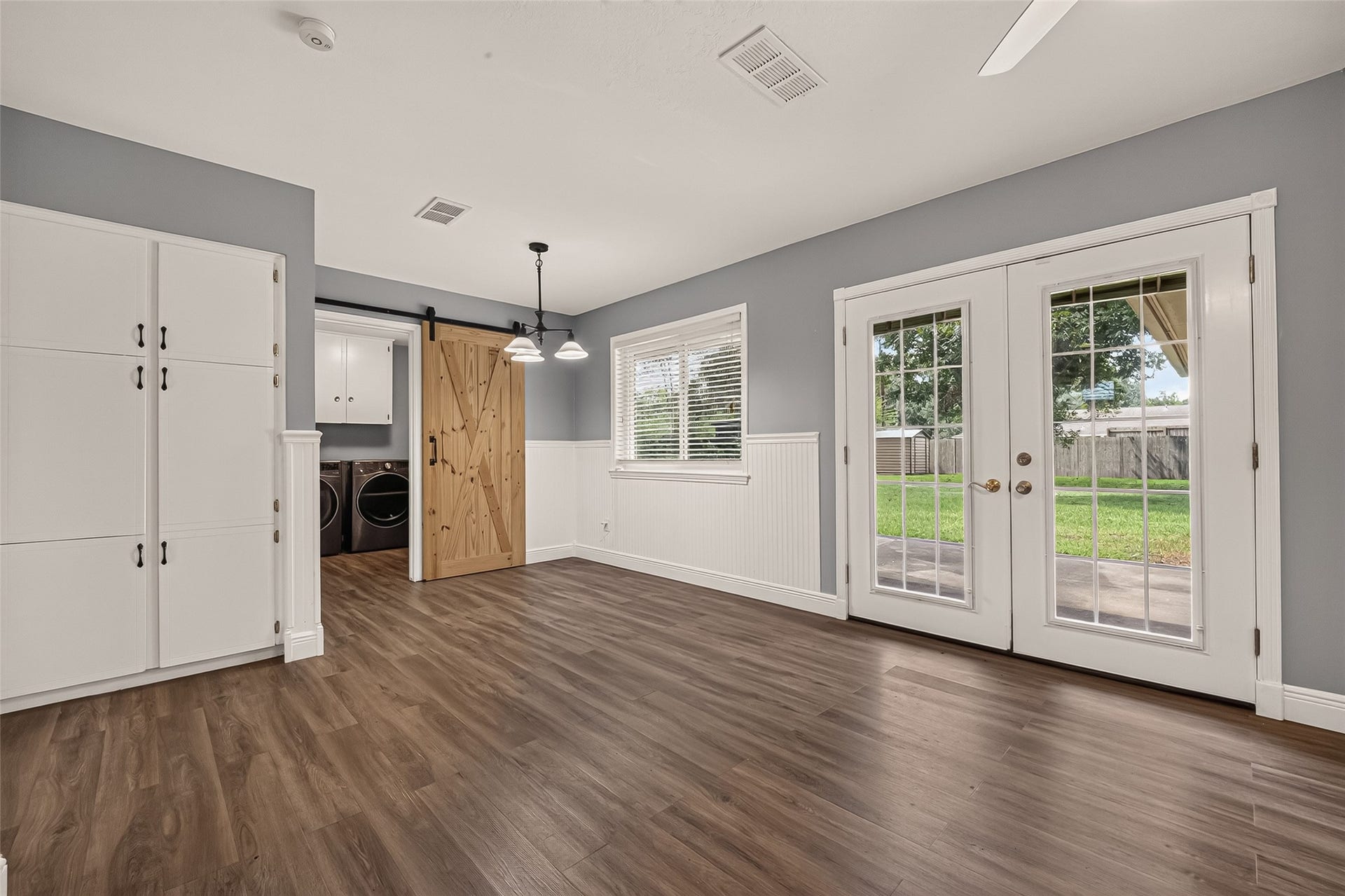 114 E Wildwinn Drive, Alvin, TX 77511 Sliding barn doors for space consumption
