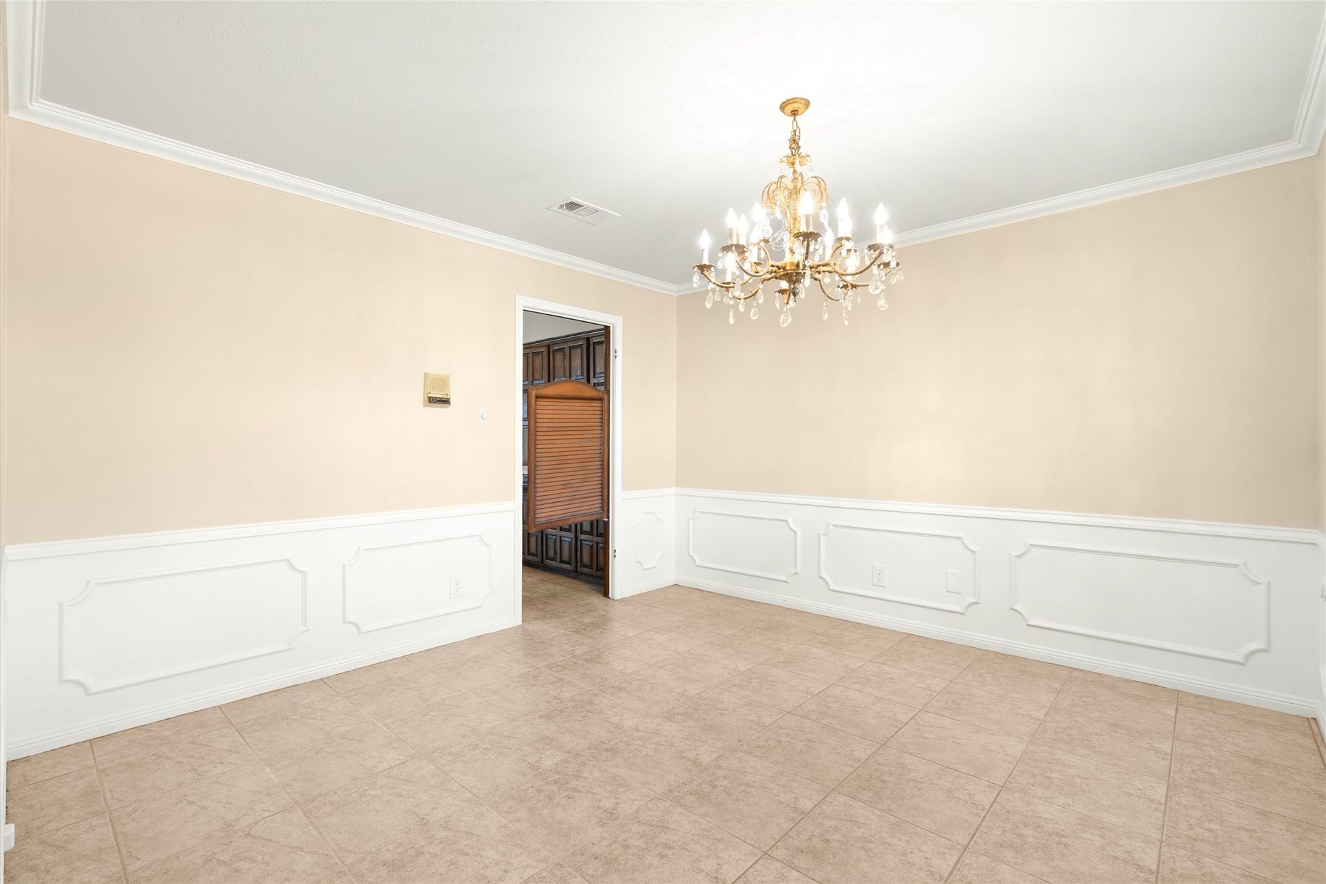 The dining room is located to the right of the entry way.
