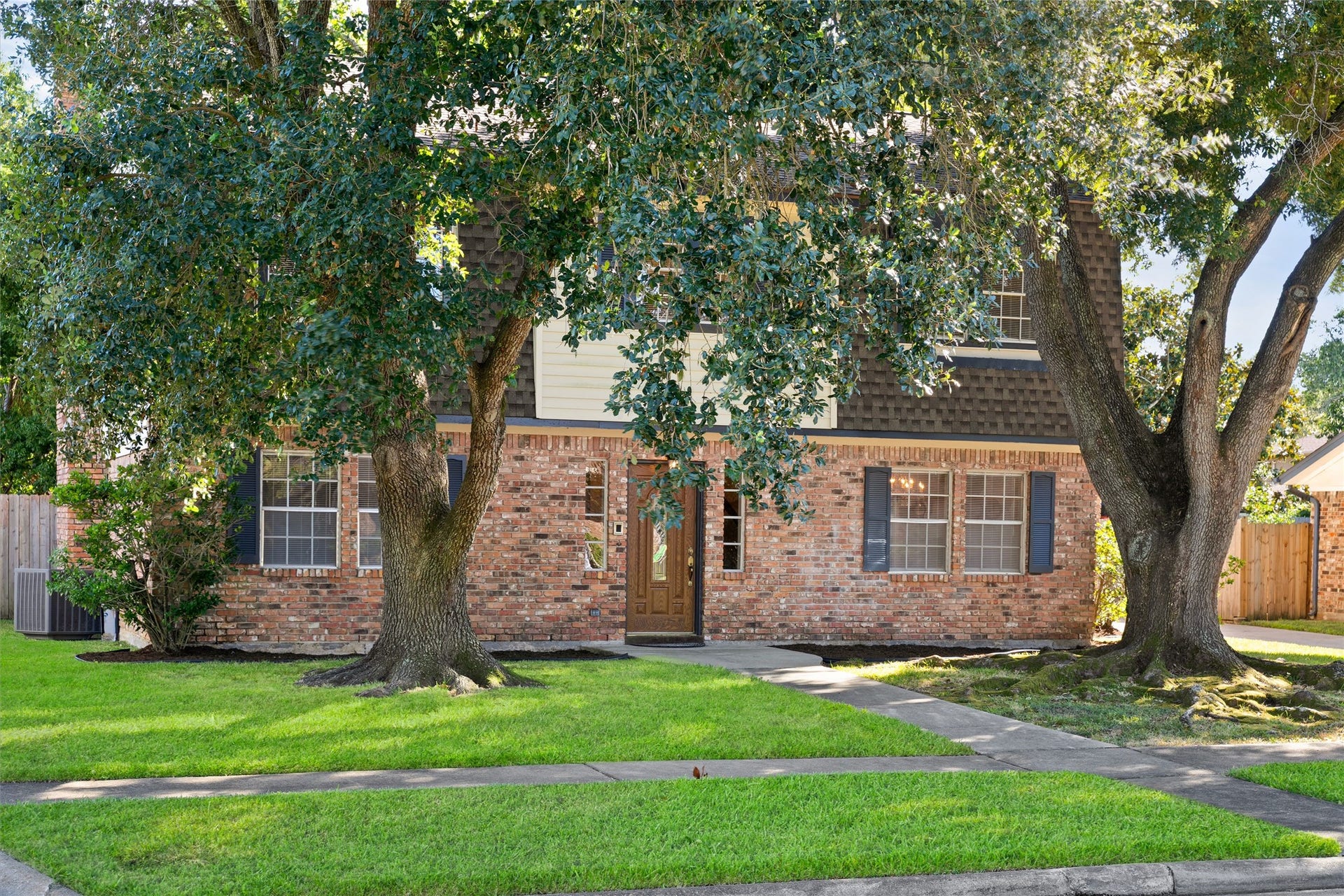 Here's another view of the oak trees you'll enjoy when you make this home your own.