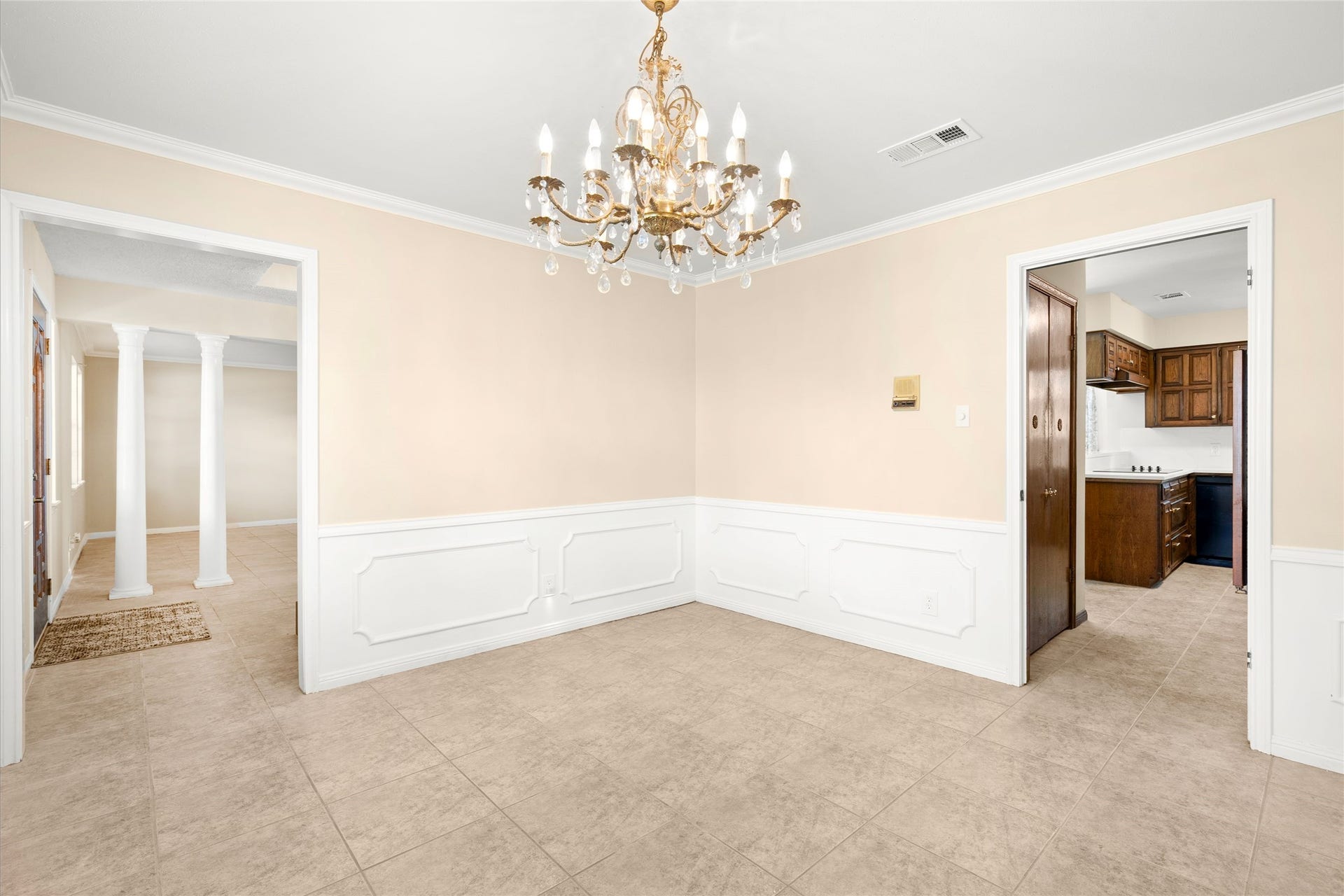 The kitchen is located just to the right off the dinng room.