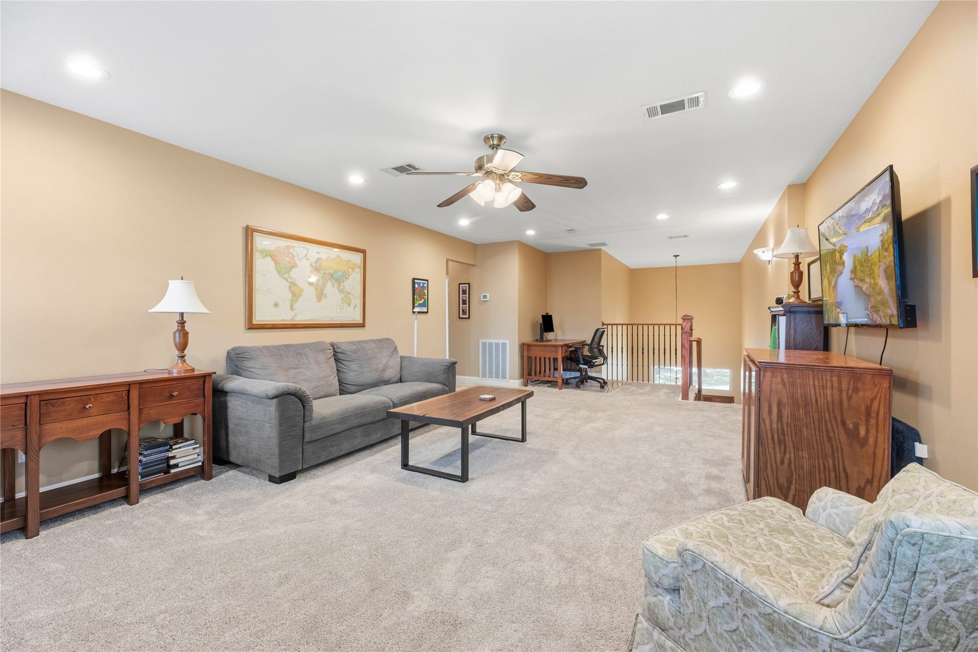 17906 Lone River Court, Houston, TX 77095 Upstairs you'll find a versatile game room with plush carpet and a ceiling fan.
