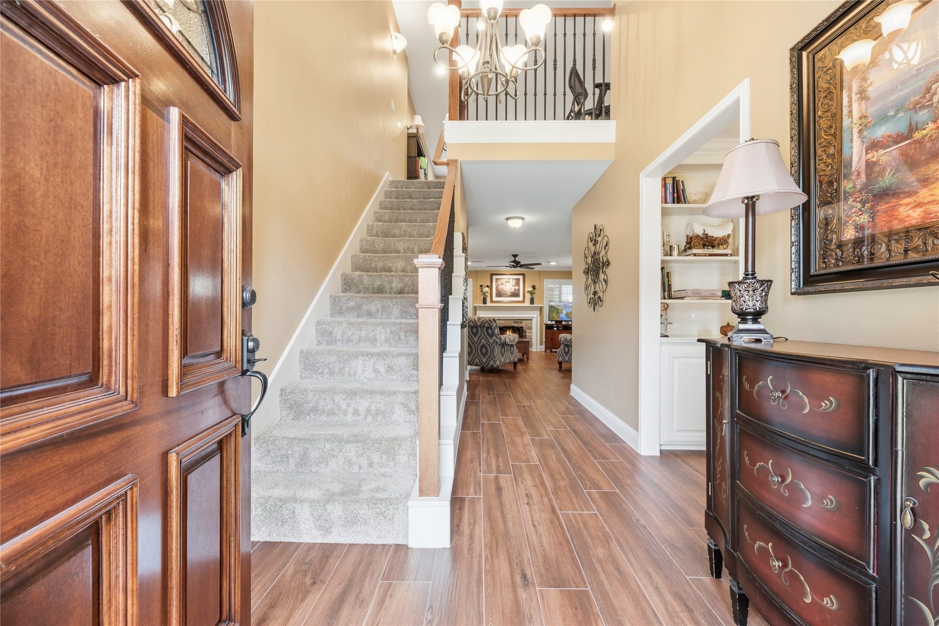 17906 Lone River Court, Houston, TX 77095 Inviting front entry offers a high ceiling and wood-look tile flooring.