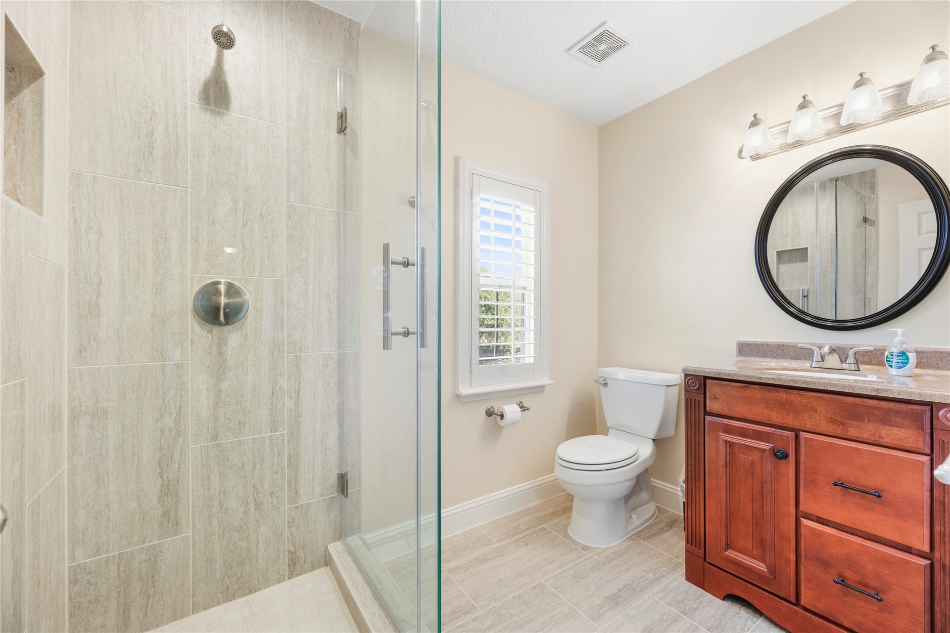 17906 Lone River Court, Houston, TX 77095 En-suite bathroom with a walk-in shower.