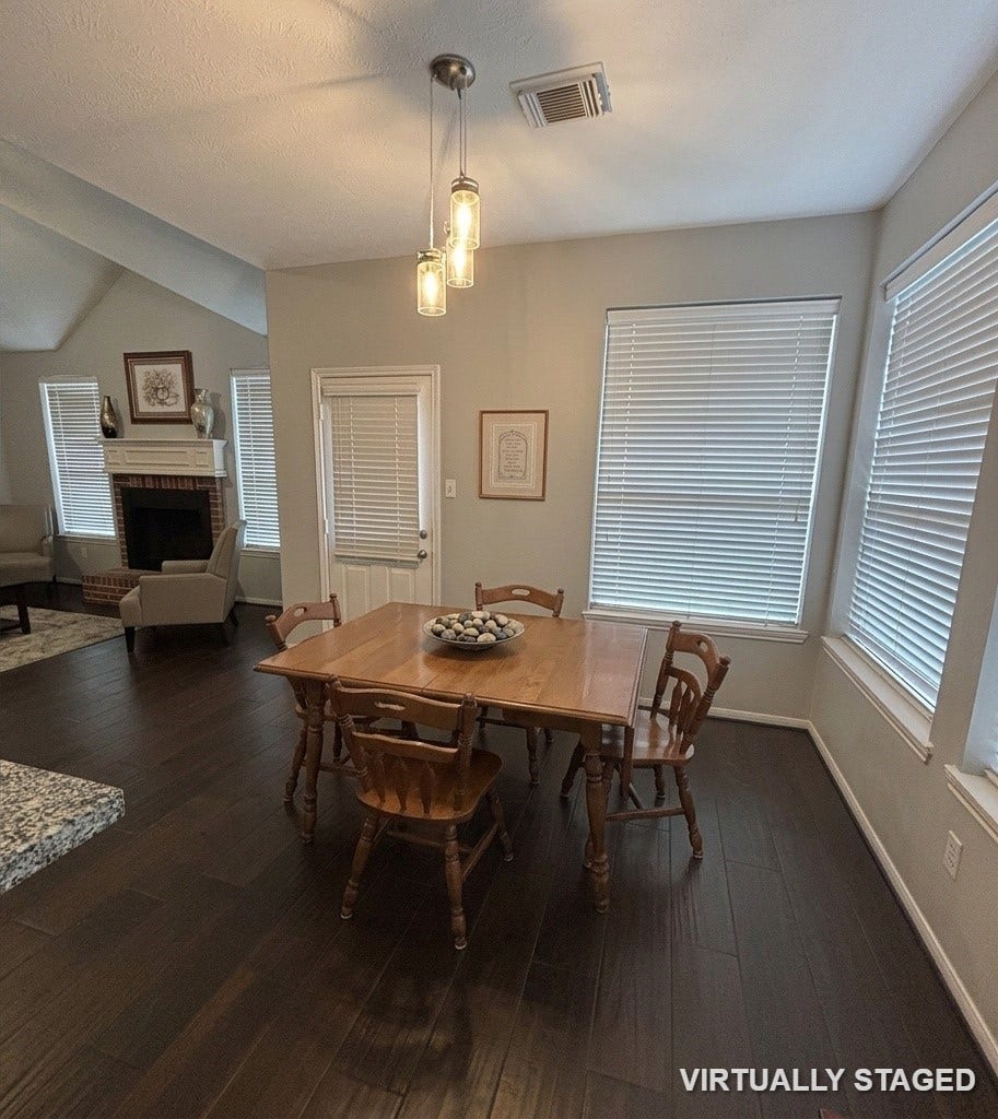 15806 Laurel Cove, Tomball, TX 77377 Bright, spacious breakfast room with plenty of natural light plus fresh neutral paint and the same beautiful flooring!