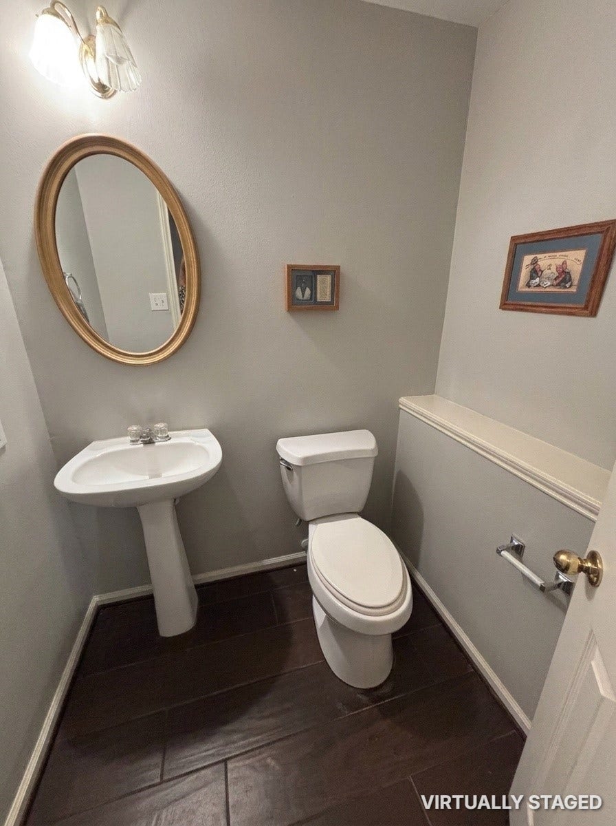 15806 Laurel Cove, Tomball, TX 77377 Guest bathroom with modern fixtures and matching tile flooring