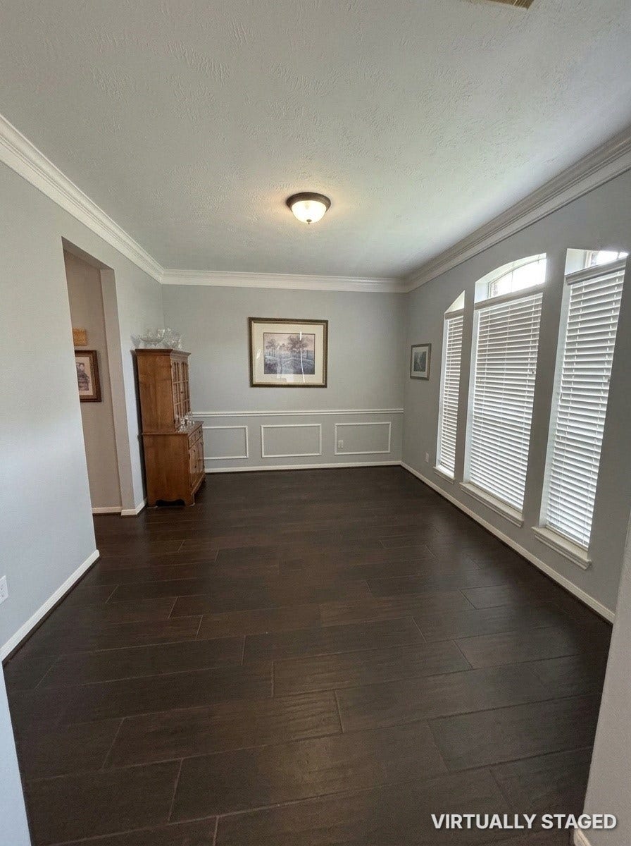 15806 Laurel Cove, Tomball, TX 77377 Formal dining room with beautiful wood-grain tile flooring and custom millwork