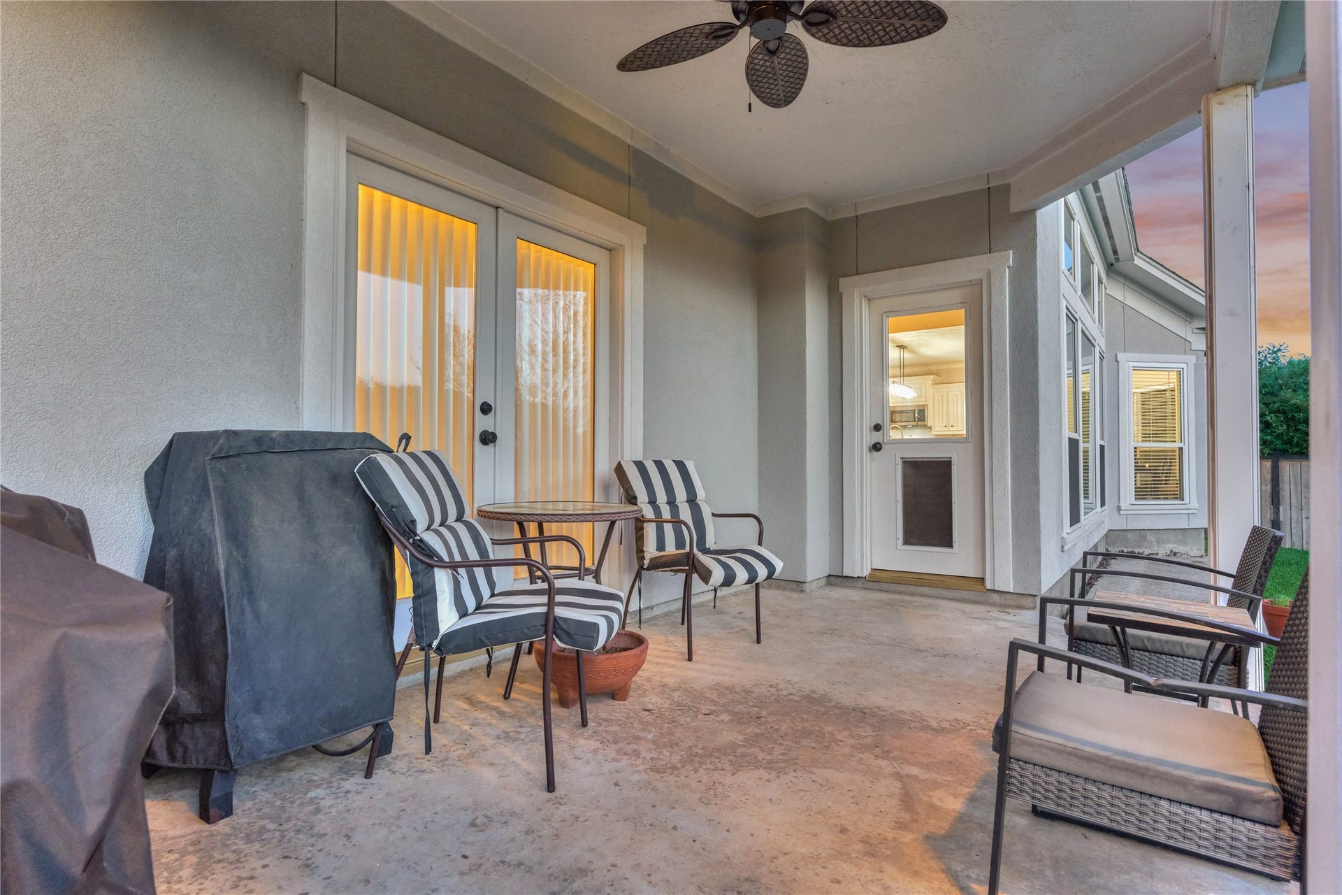 15 Newberry Court, Montgomery, TX 77356 Access from the living room and the owners retreat creates a seamless connection to the patio and backyard for effortless indoor-outdoor living.