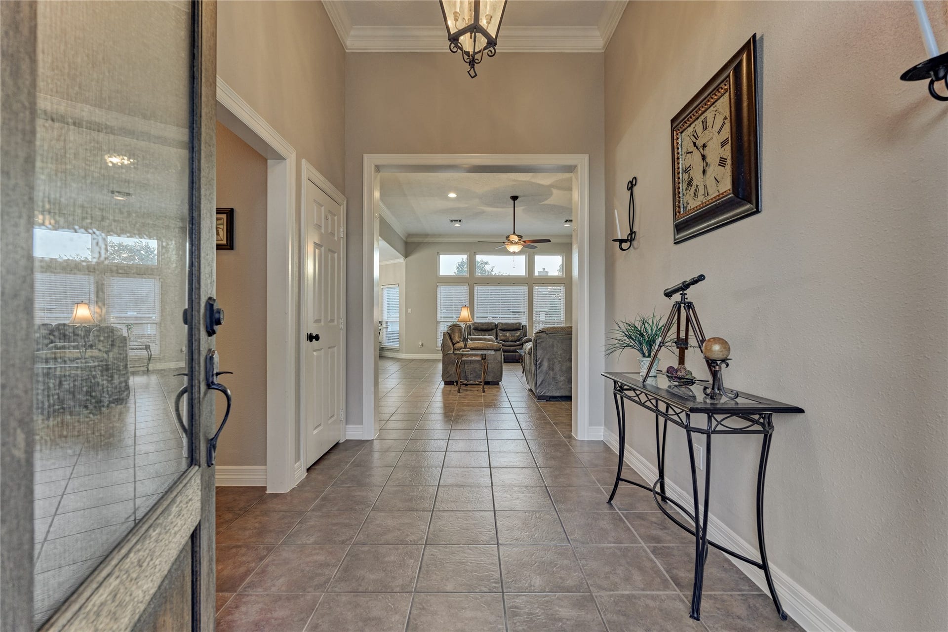 15 Newberry Court, Montgomery, TX 77356 Spacious foyer with high ceilings and elegant crown molding sets the tone for this beautiful home.