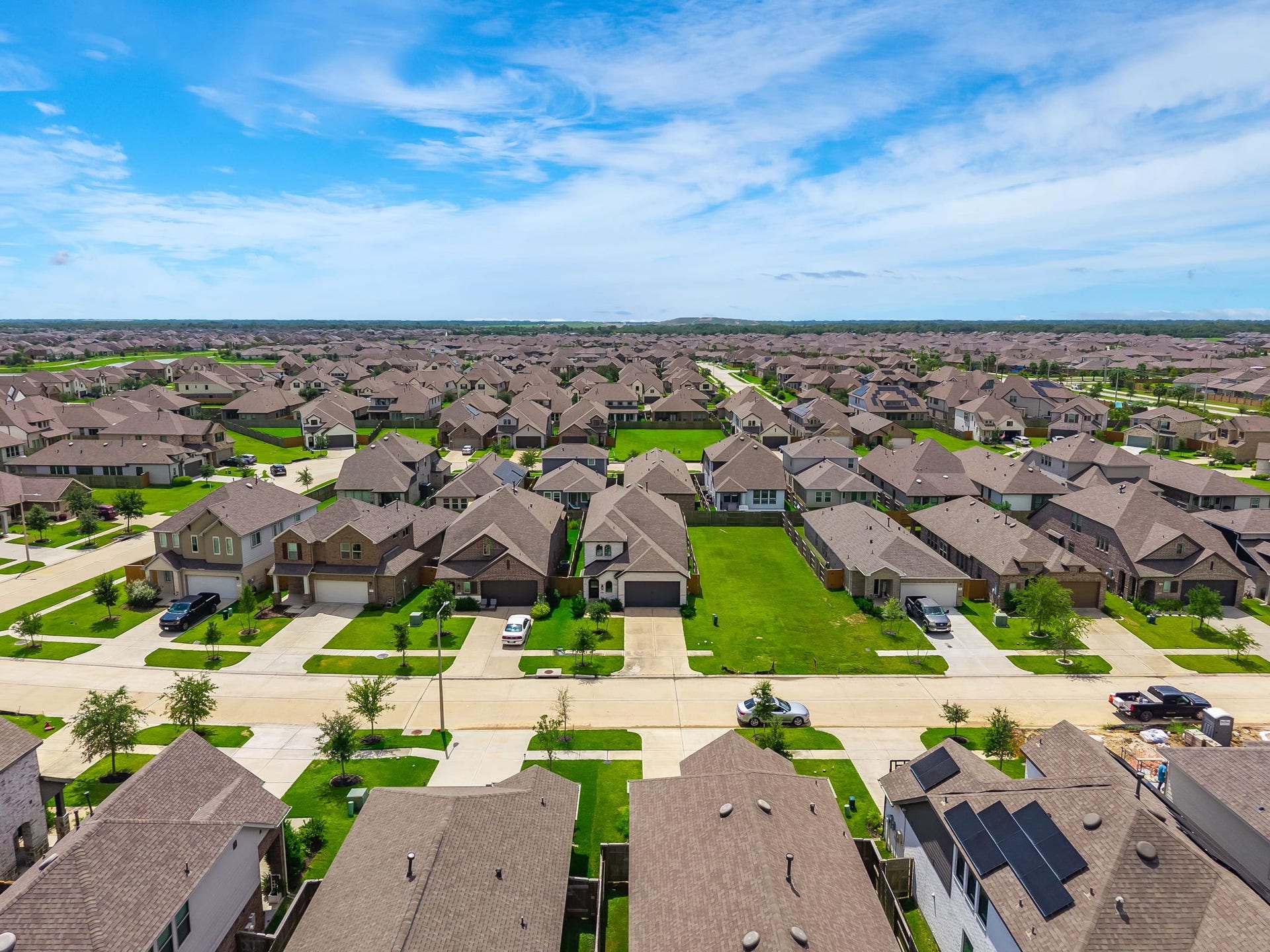 13021 Sapphire Lake Lane, La Marque, TX 77568 The aerial view captures the surrounding Lago Mar neighborhood, green space, and nearby homes. It adds scale and context to the community setting. Virtually staged.