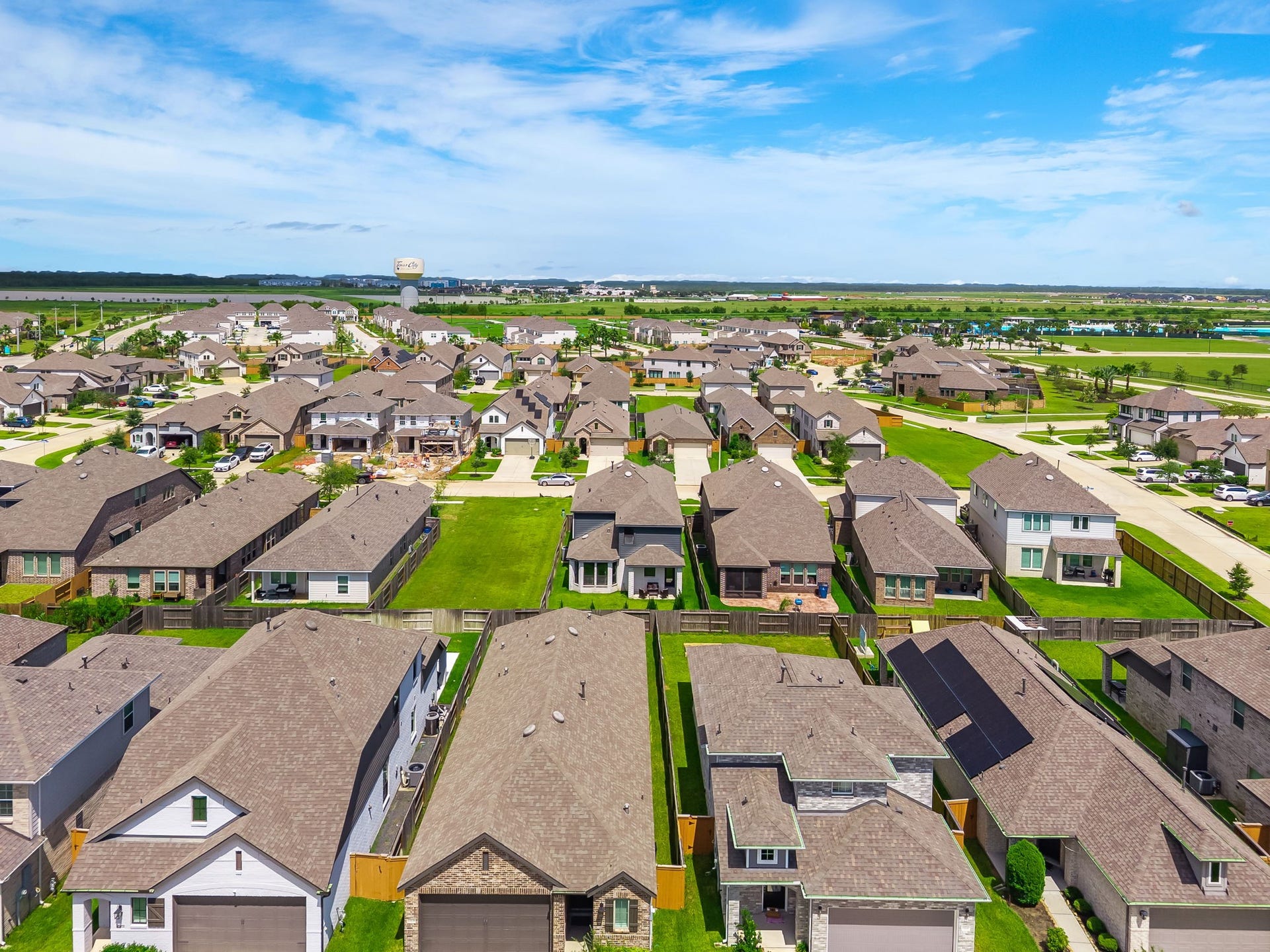 13021 Sapphire Lake Lane, La Marque, TX 77568 The wider aerial shows Lago Mars growing master-planned setting with broad neighborhood views. A final perspective on location, lifestyle, and community scale. Virtually staged.