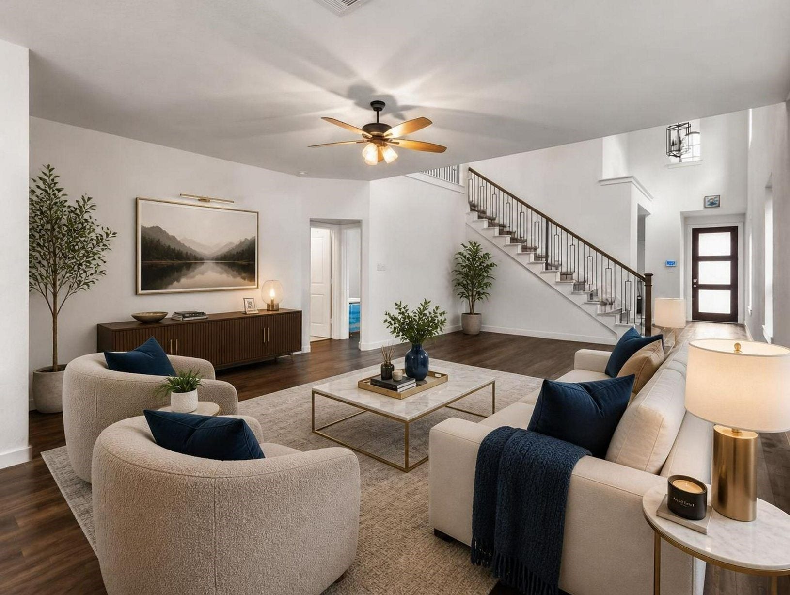 13021 Sapphire Lake Lane, La Marque, TX 77568 The living room opens with warm flooring, natural light, and a seamless connection to the kitchen. The space feels composed, open, and elevated. Virtually staged.