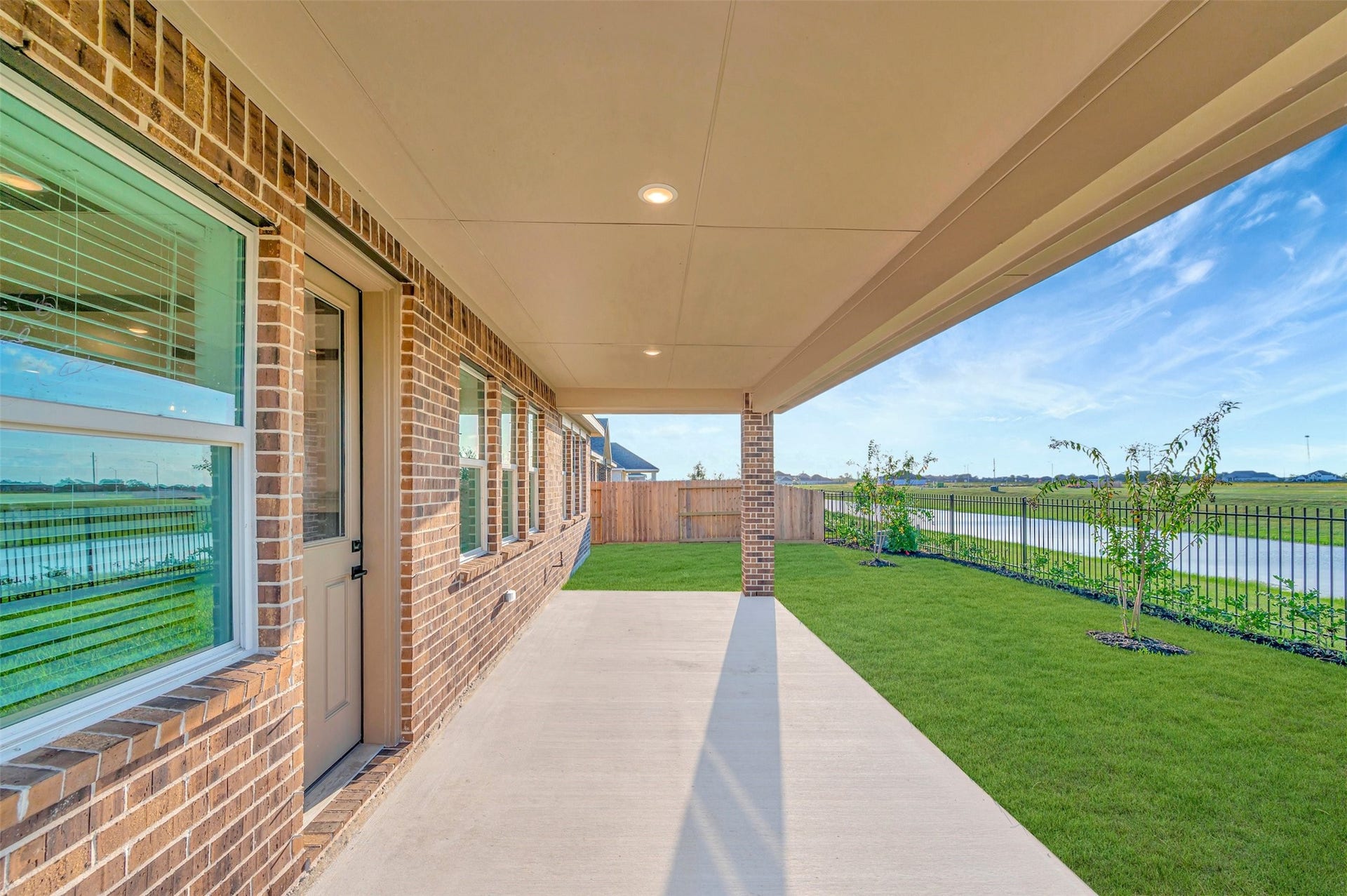 12027 Old Fashion Circle, Mont Belvieu, TX 77535 Relax outdoors on the covered patio