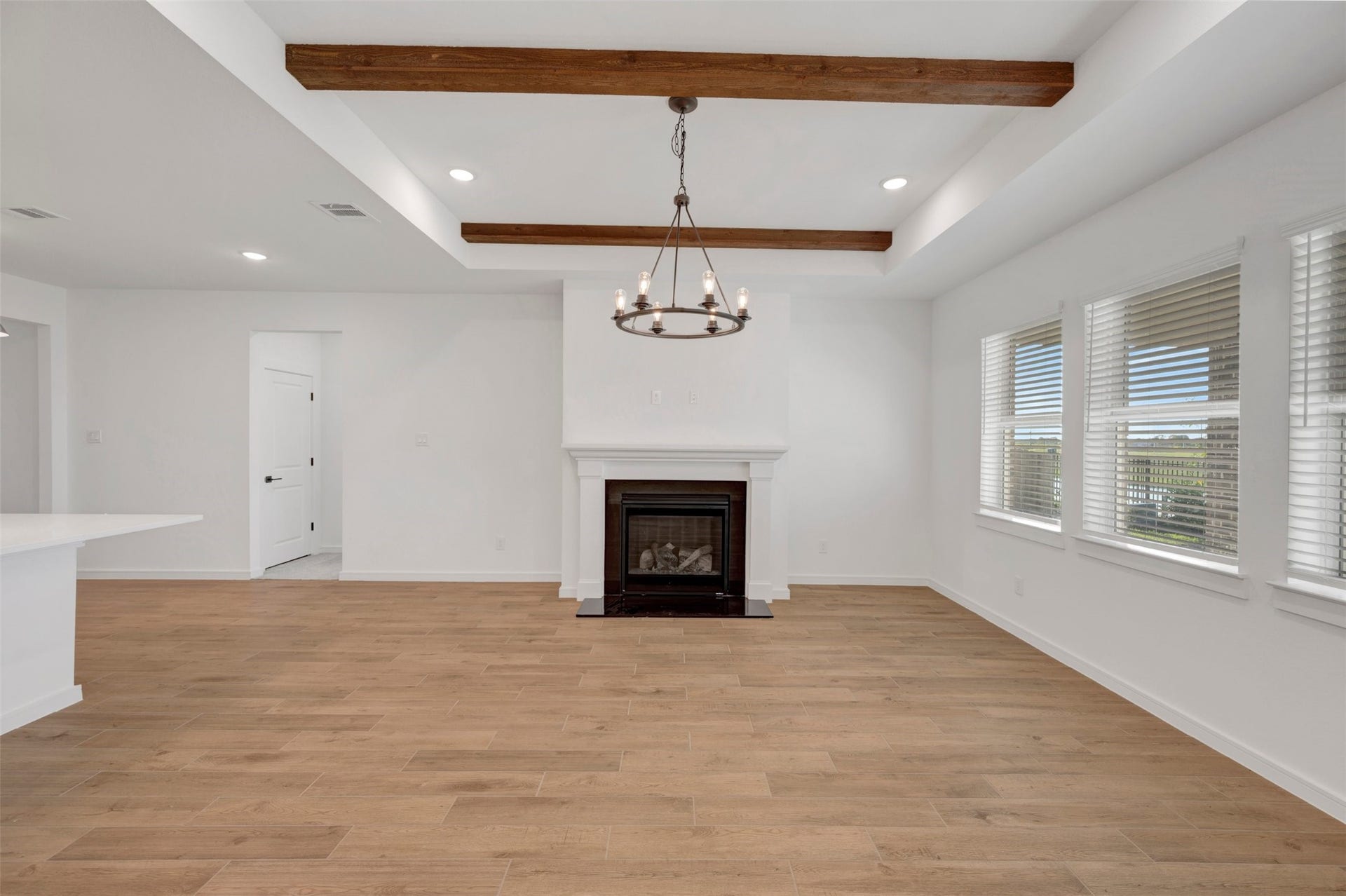 12027 Old Fashion Circle, Mont Belvieu, TX 77535 Open great room with fireplace