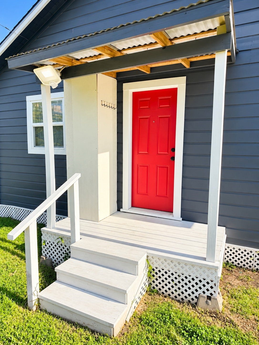 109 N Avenue A Avenue, Freeport, TX 77541 Inviting back porch with convenient access to the spacious backyard, perfect for relaxing and enjoying the outdoors