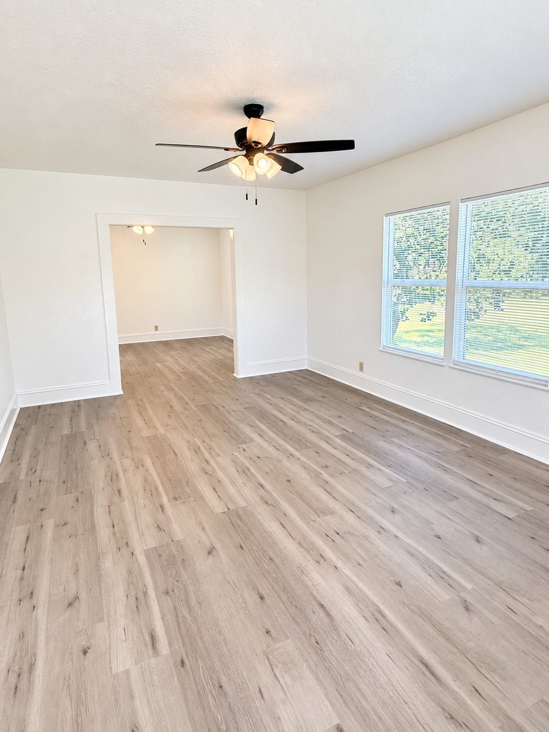 109 N Avenue A Avenue, Freeport, TX 77541 Welcoming entryway opens into a bright living room that flows seamlessly into the dining area, creating an inviting layout
