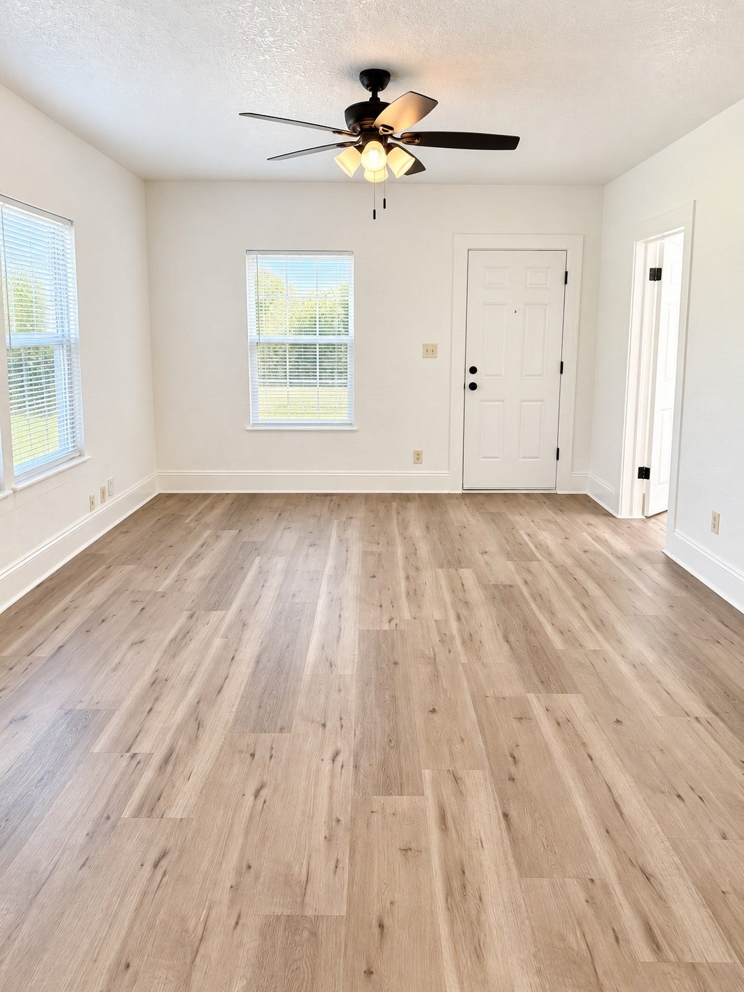 109 N Avenue A Avenue, Freeport, TX 77541 Inviting living room filled with beautiful natural light, creating a bright and welcoming atmosphere