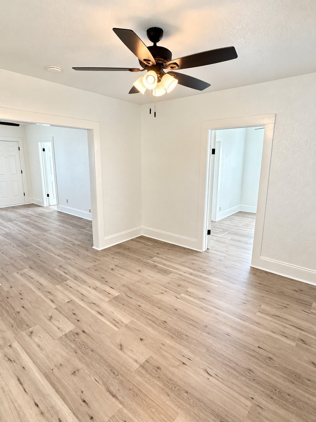 109 N Avenue A Avenue, Freeport, TX 77541 Centrally located dining room offers convenient access to Bedroom 2, the living room, and kitchen, creating a functional and inviting layout