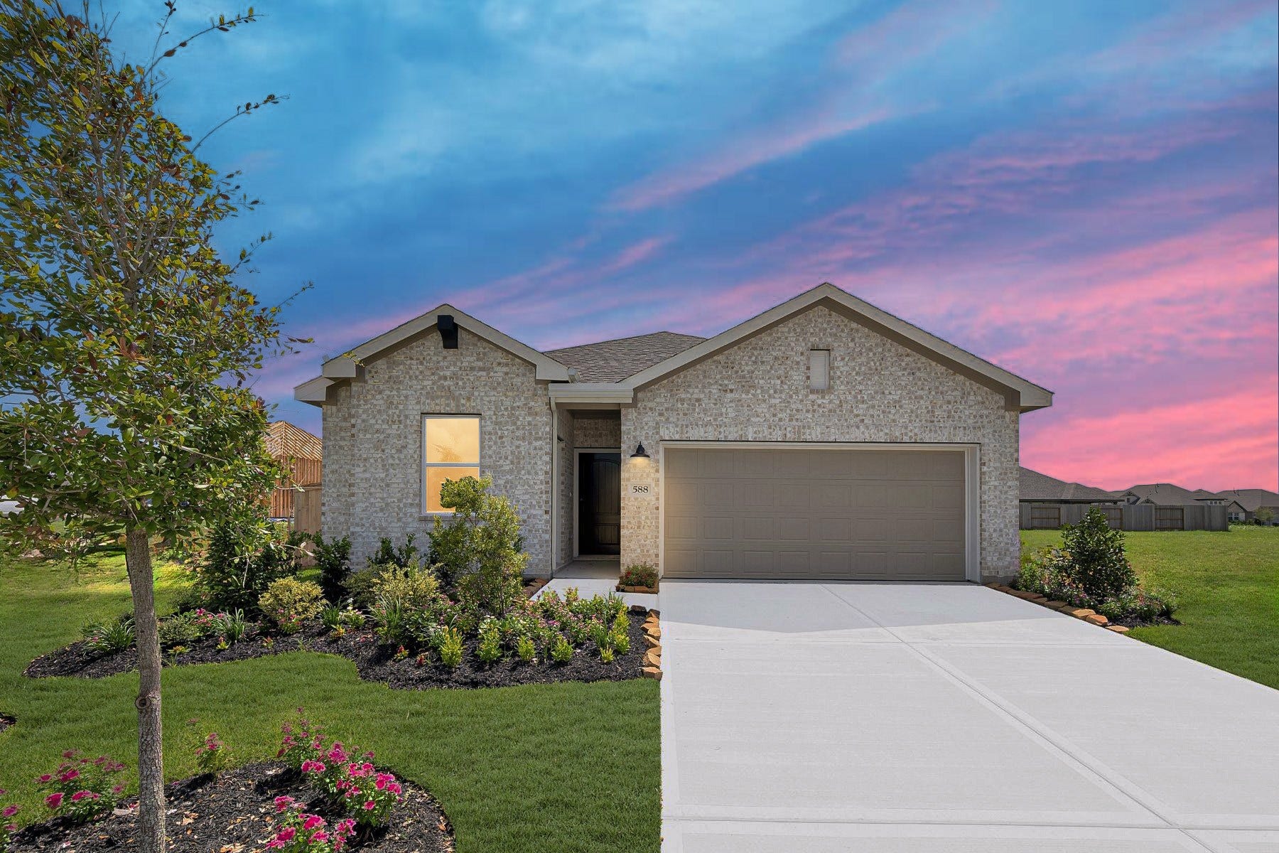 655 Daniels Lake Lane, Dayton, TX 77535 *Photo is for illustrative purposes only and may not depict the actual home. Features, materials, colors, and specifications may vary. Actual home will have a 4 car tandem garage.*
