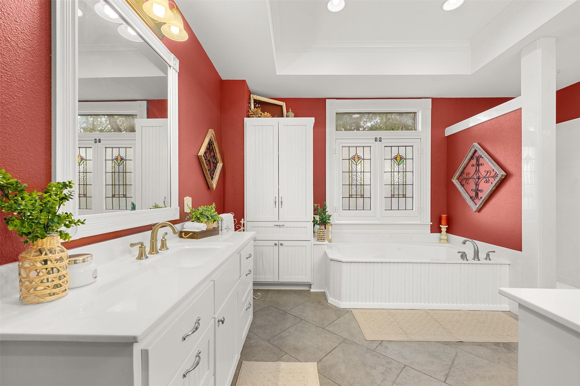 326 W Colorado Street, La Grange, TX 78945 Dual vanities provide generous personal space and storage within the large primary bath.