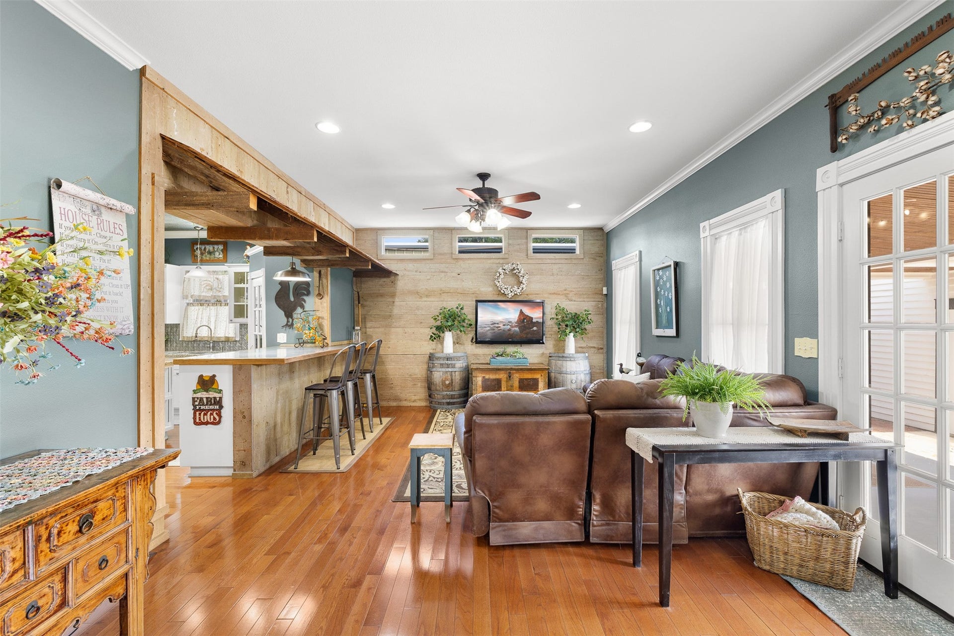 326 W Colorado Street, La Grange, TX 78945 Rich wood floors and an open connection to the kitchen make the family room comfortable, inviting and ideal for gathering.