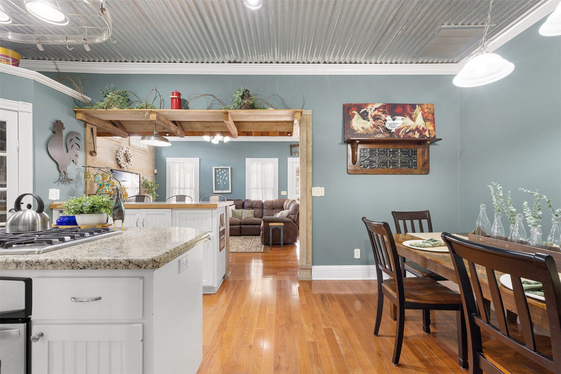 326 W Colorado Street, La Grange, TX 78945 An open view from the kitchen toward the dining area and family room highlights the homes warm and connected layout.