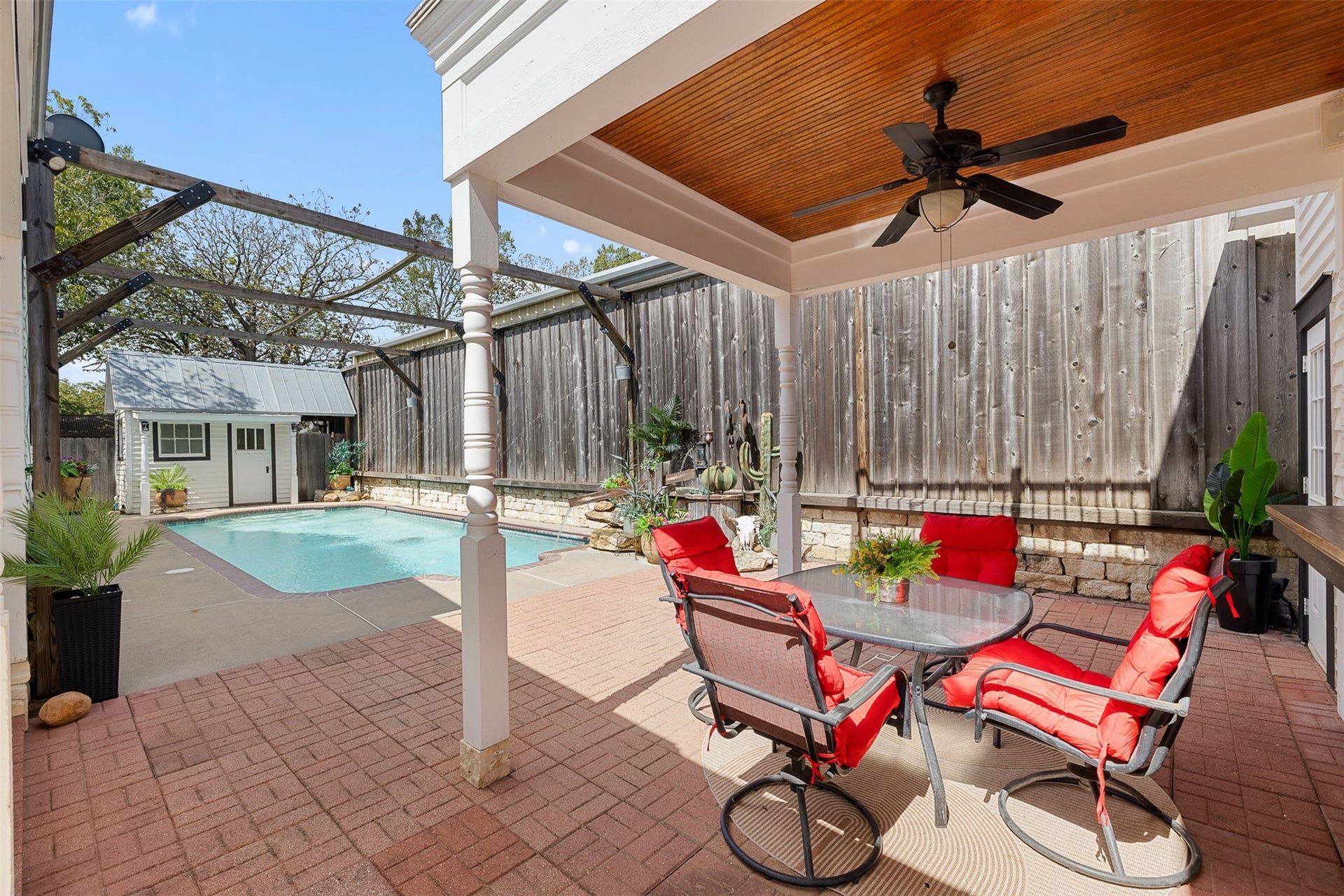 326 W Colorado Street, La Grange, TX 78945 The shaded poolside patio is ready for leisurely afternoons, casual meals and warm Texas evenings.