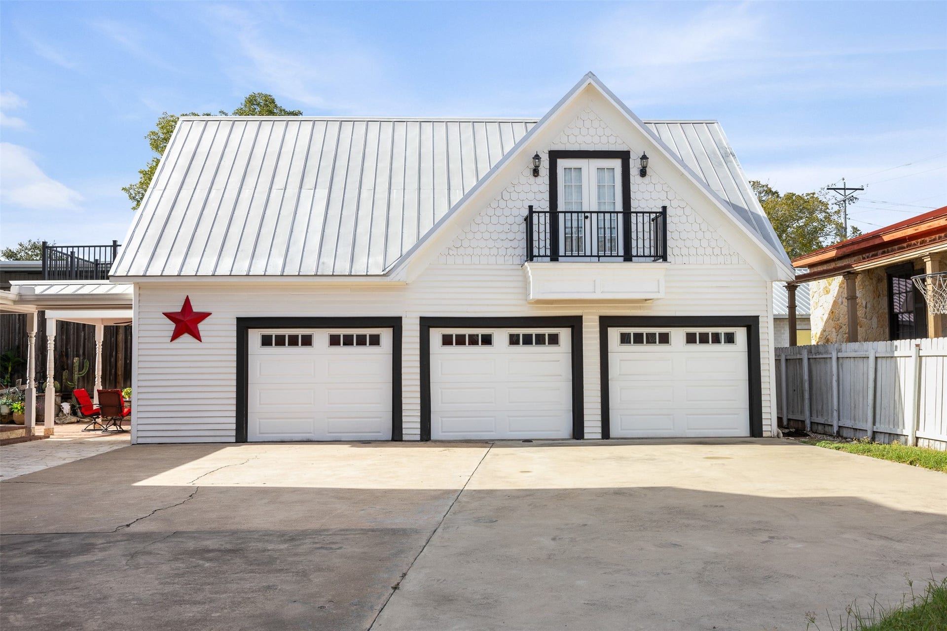 326 W Colorado Street, La Grange, TX 78945 The oversized detached garage was designed to complement the architecture and character of the main residence.